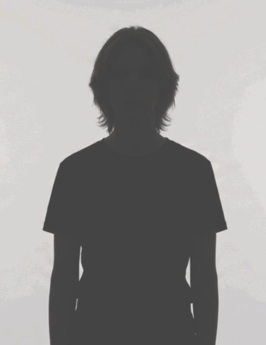 Silhouette of a person with medium-length hair.
