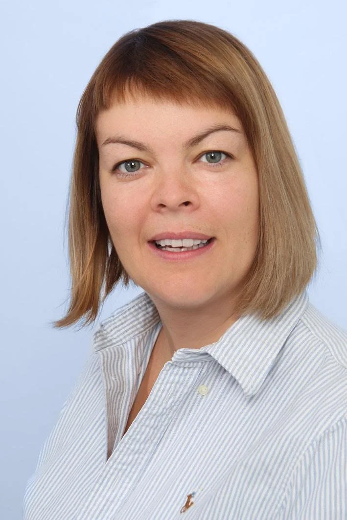 Professional portrait of attorney Elena Dvoinik, New York attorney focusing on immigration law, civil litigation, administrative matters, and complex cross-border disputes