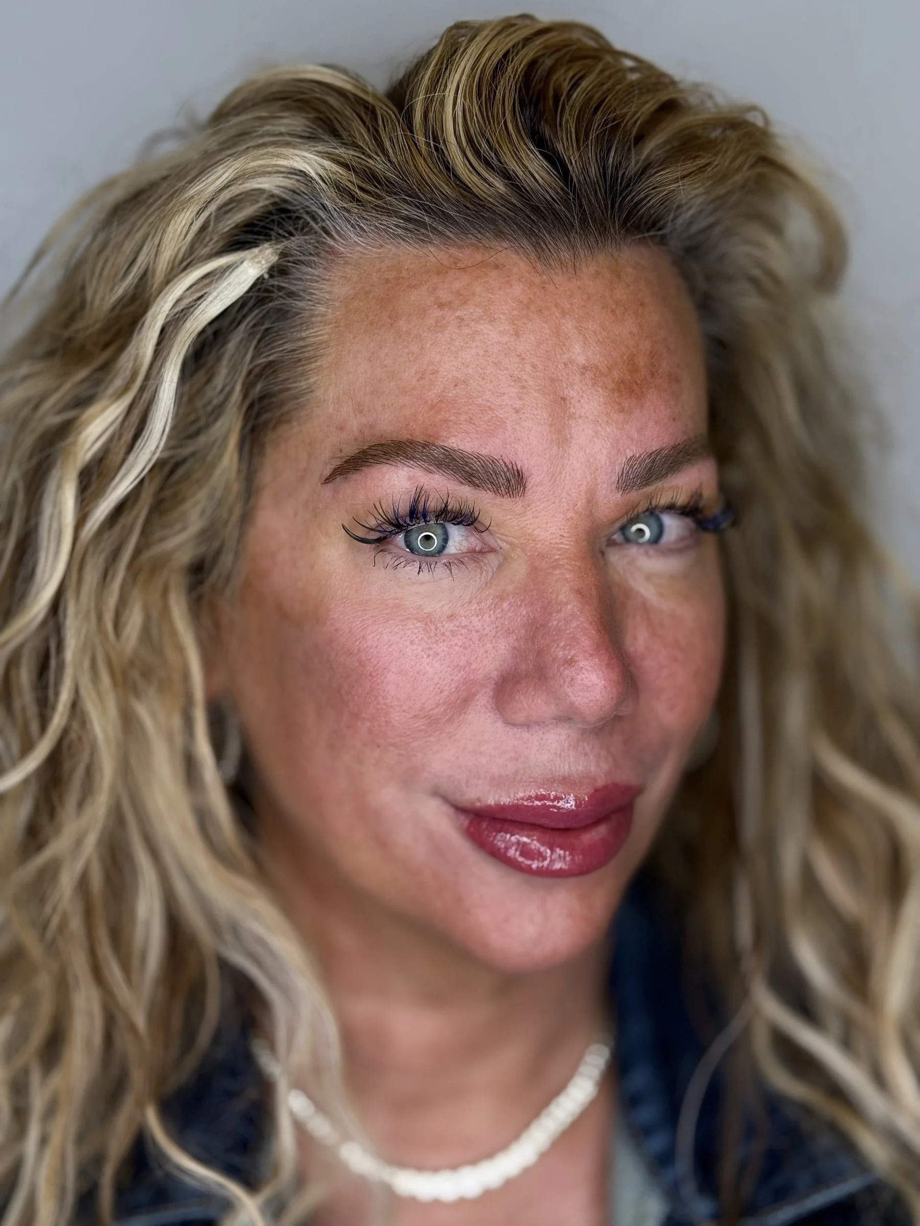 Client with brows and lip blush by Microblading Charleston in Mount Pleasant, SC