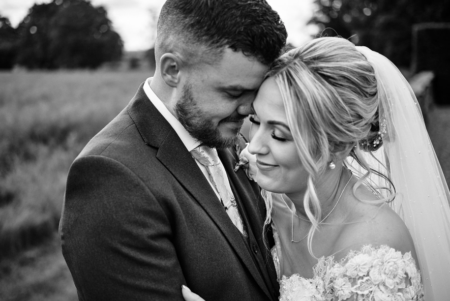 The gorgeous couple share a loving moment @ StuartJamesPhotography