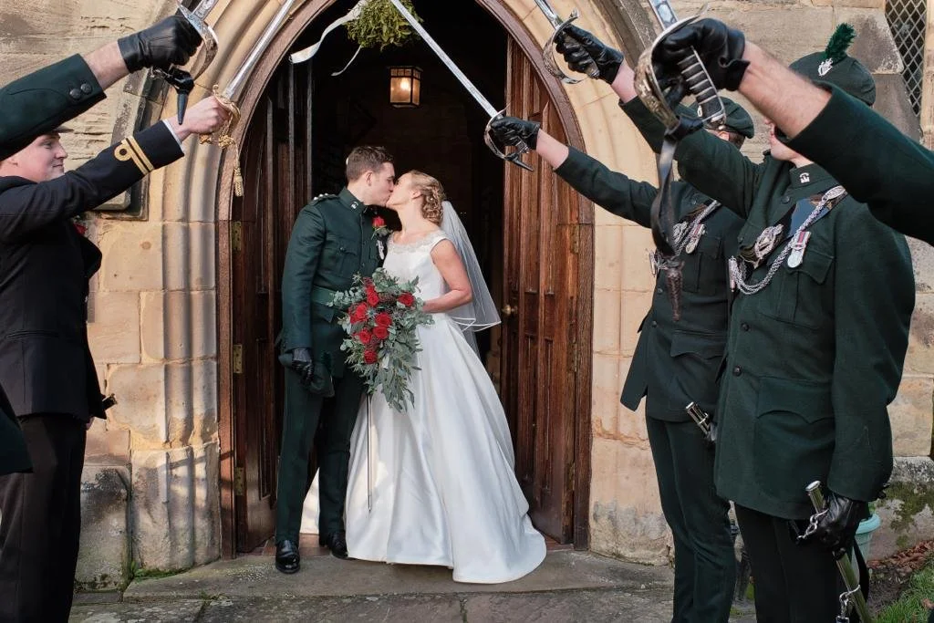Saluting the newly married couple Military Wedding @IanBursillPhotography