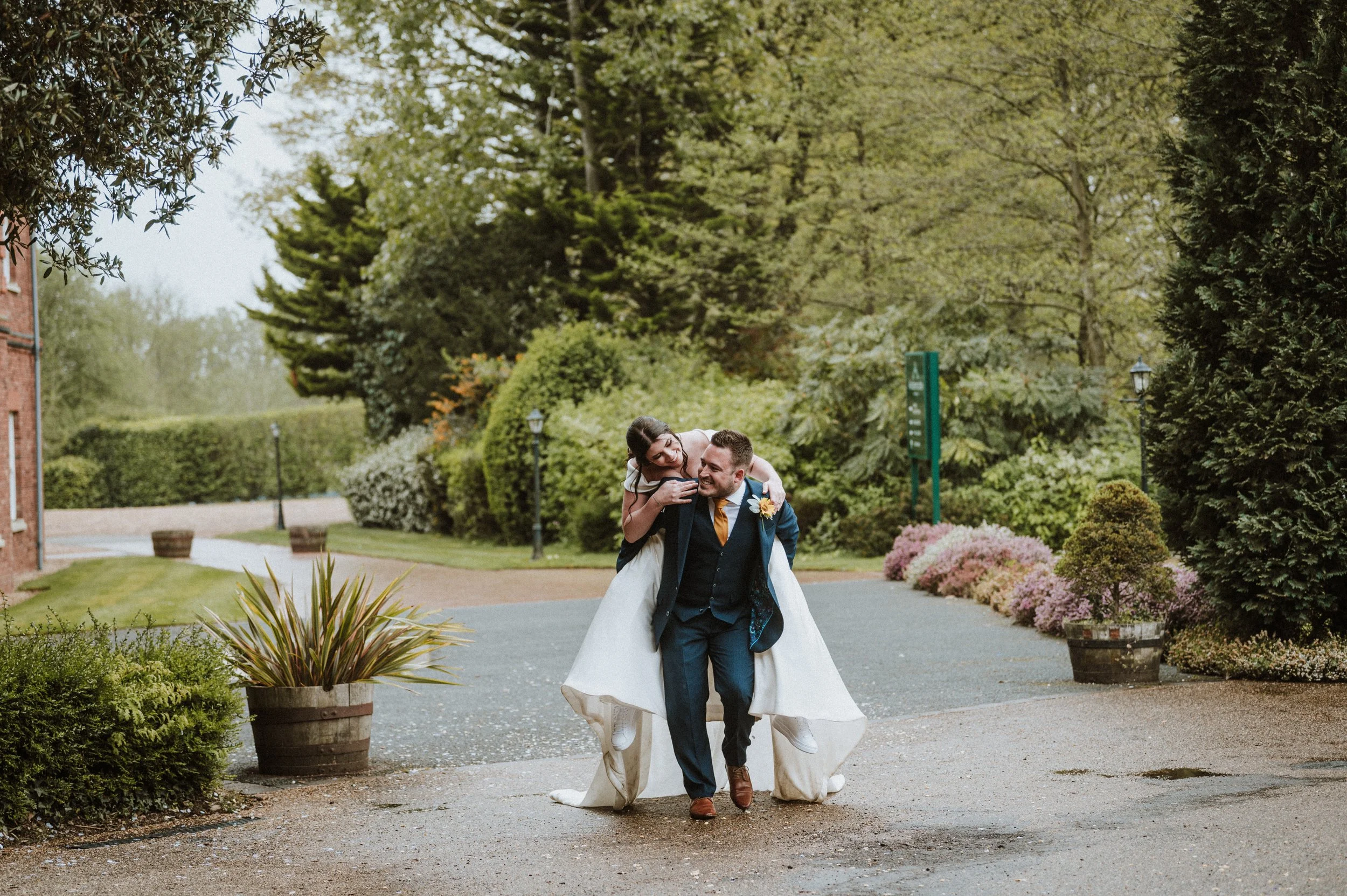 Love is... piggybacks in the rain @RyanJarvisPhotography