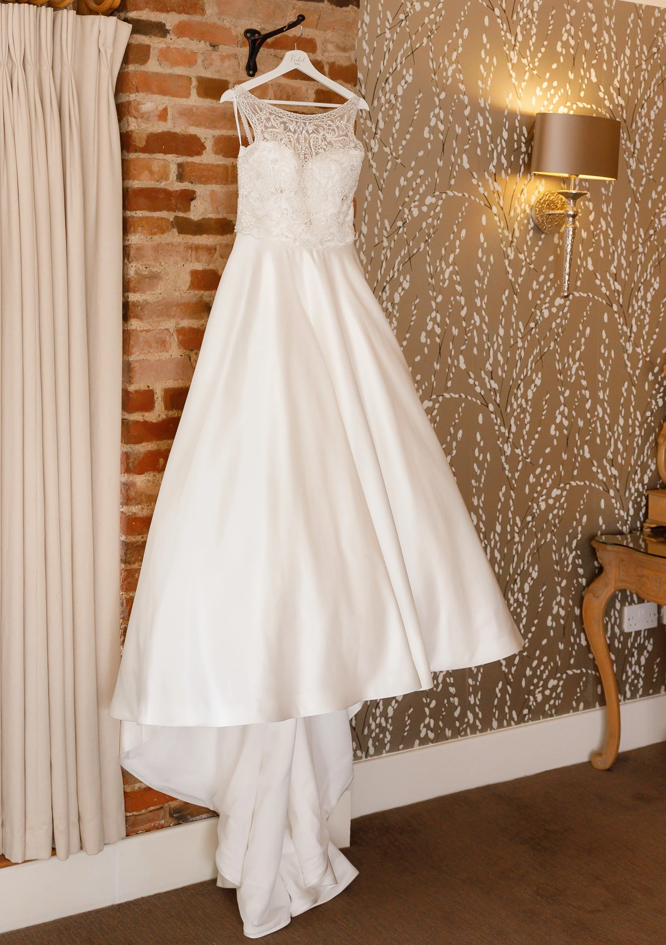 Rachel's romantic Catherine by Ellis Bridal. Intricately beaded bodice and a full A-line satin skirt.