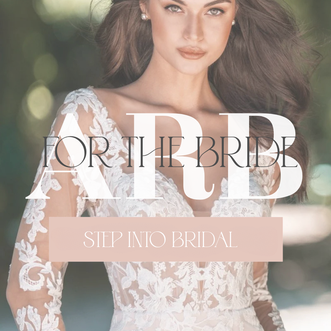 A woman in a white lace wedding dress outdoors, with text overlay that says 'AD FOR THE BRIDE STEP INTO BRIDAL'.