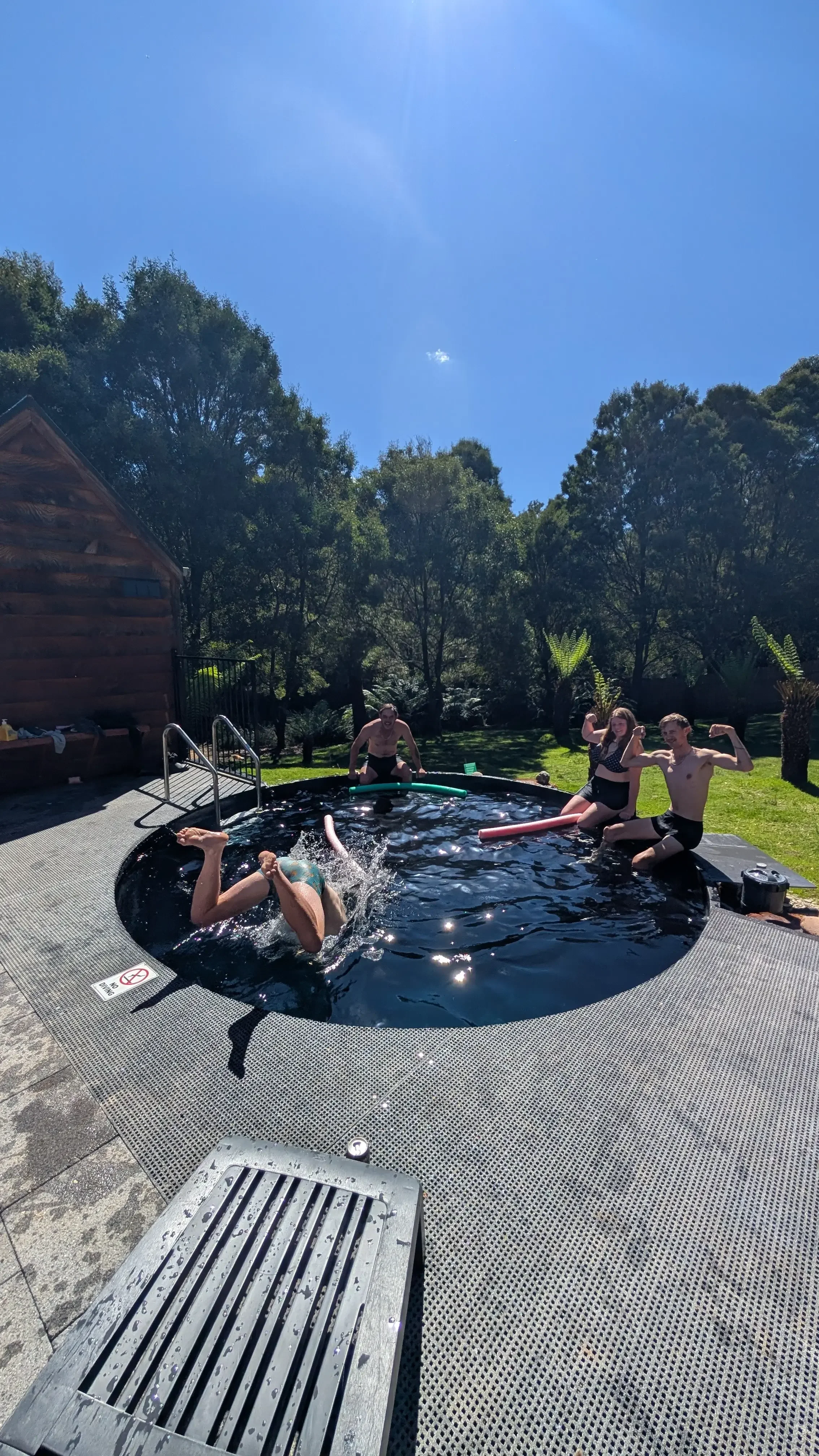Group of four enjoying the deep cold plunge pool