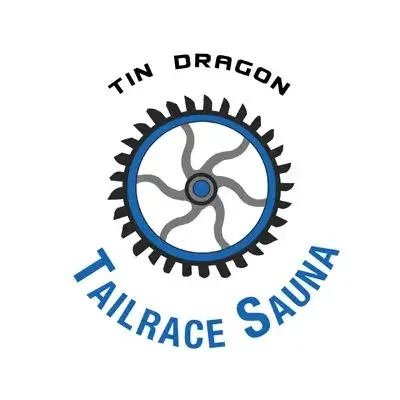 Tailrace Sauna Logo with water wheel as the main feature