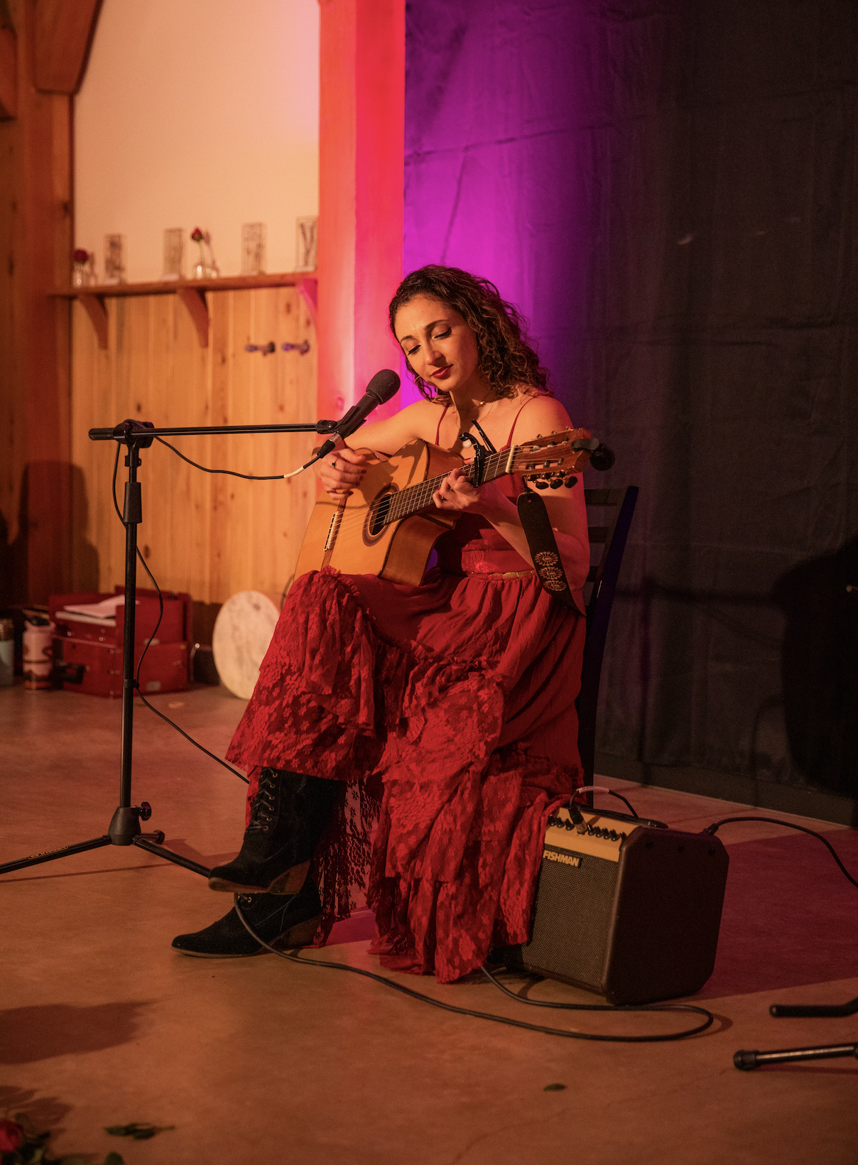 Singer Songwriter Vocal Artist Jessica Sirena performing an intimate show with a guitar