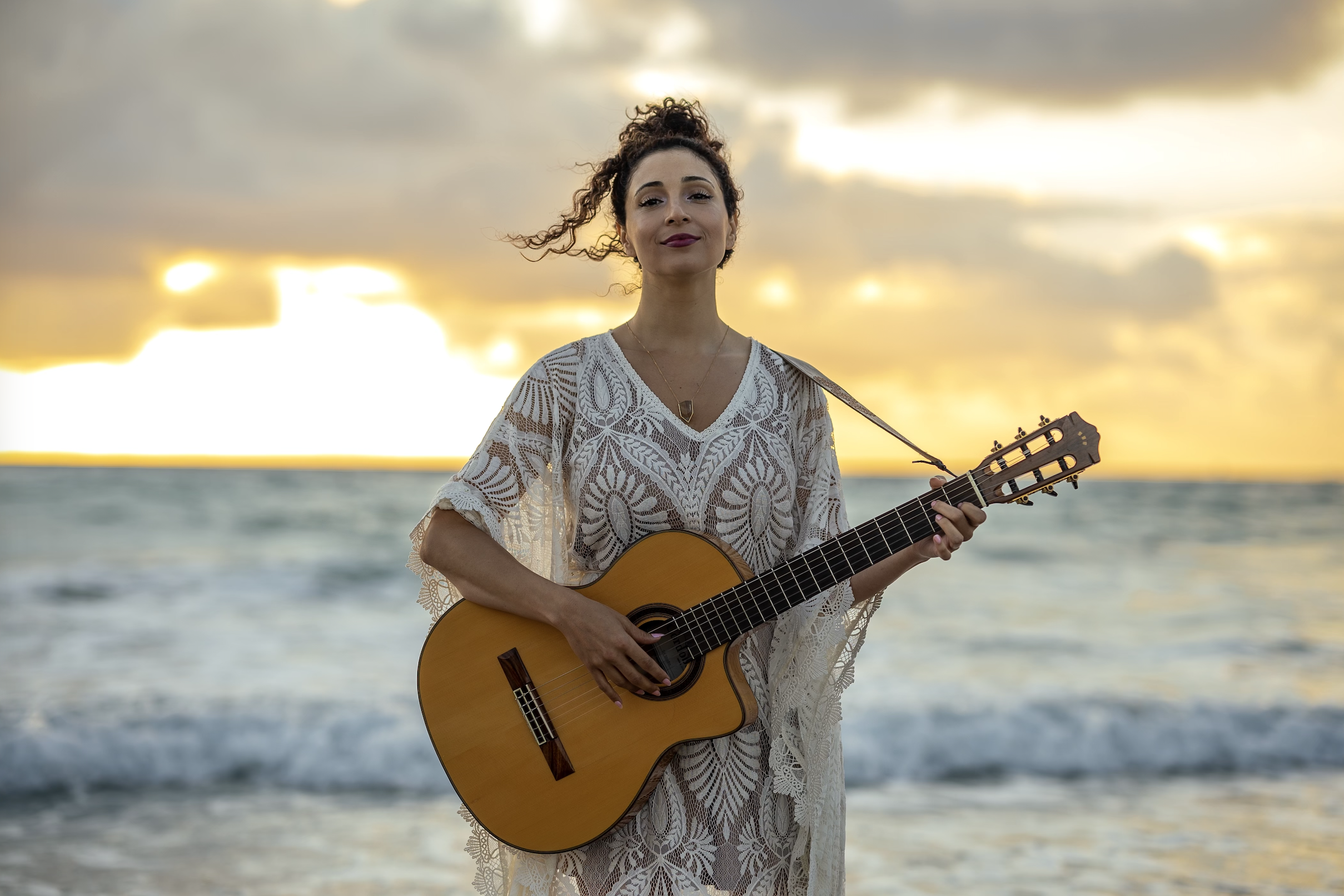 Vocal coach Jessica Sirena offers private voice mentorship and group voice programs online for singers and speakers