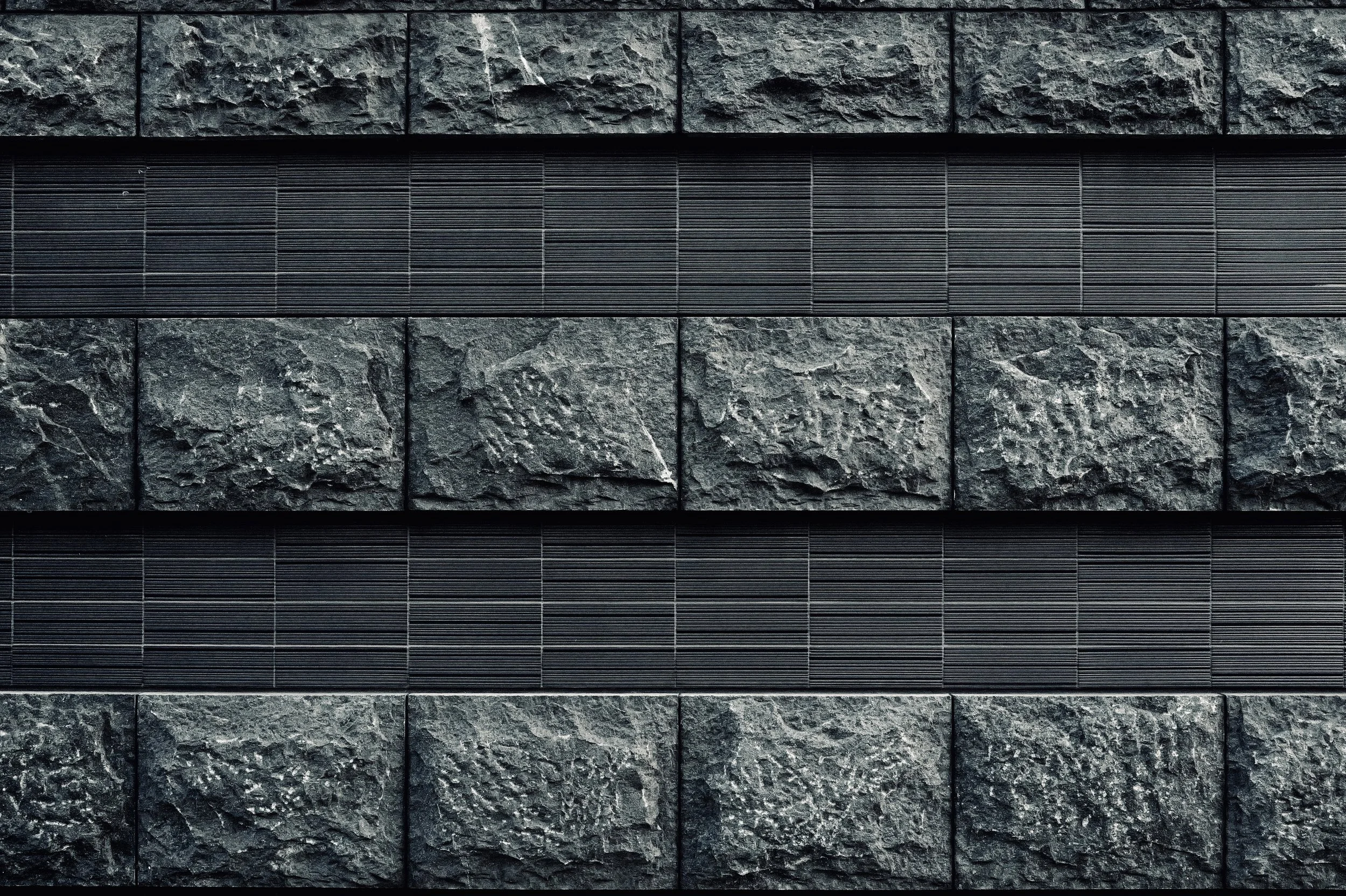 Horizontal layered rough stone wall texture - Minimalist architectural detail fine art photography