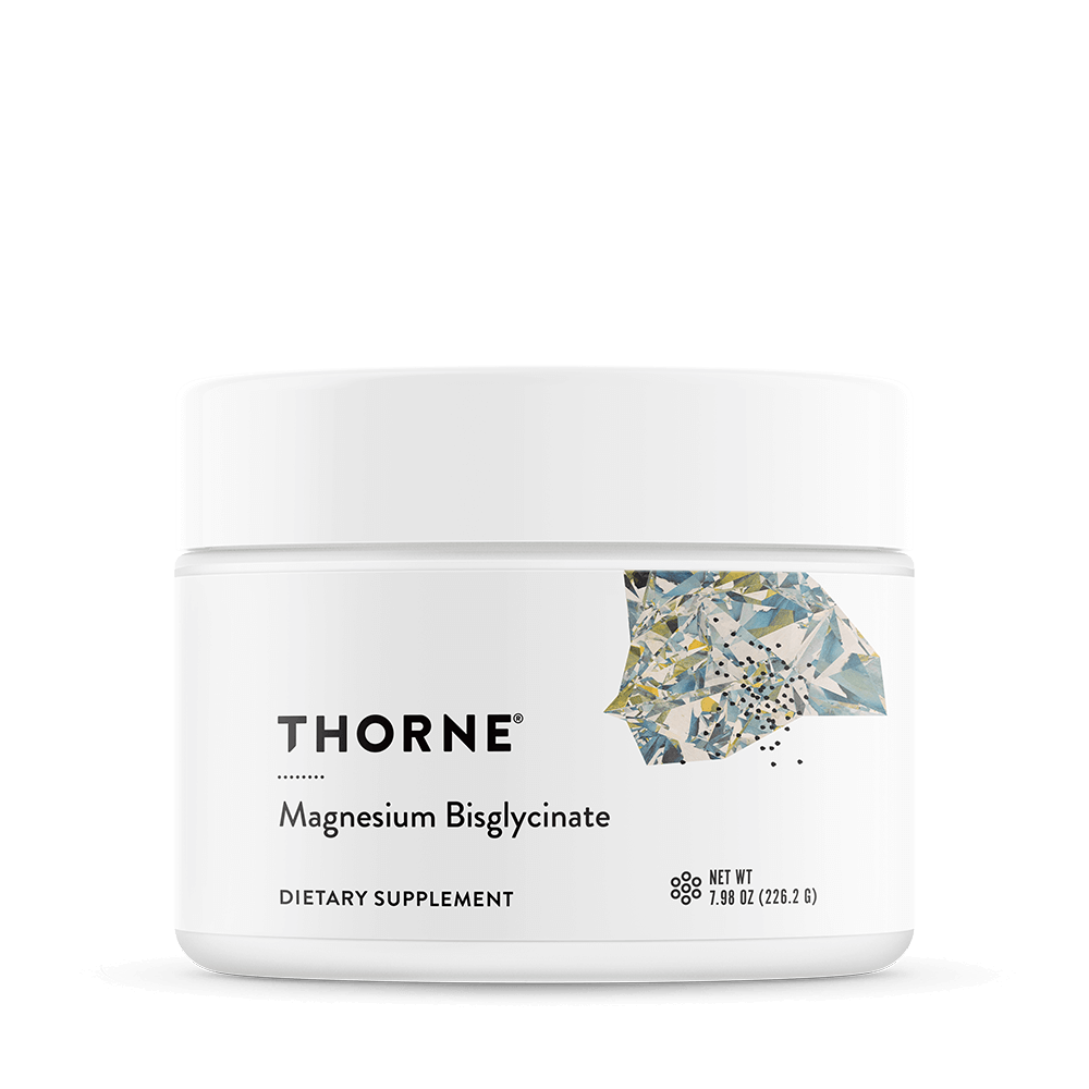 White container of Thorne Magnesium Bisglycinate dietary supplement with a diamond-like graphic on the label.