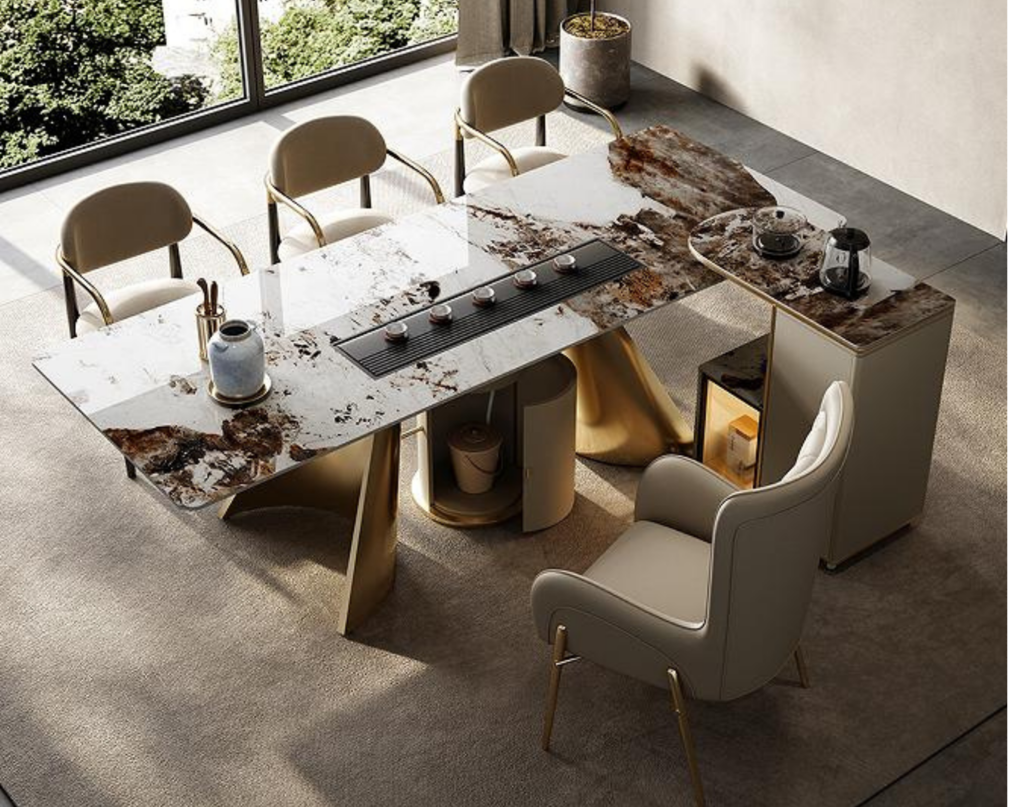 Modern dining room with a large marble table surrounded by white chairs with gold accents. A large window shows greenery outside, and there are decorative items such as vases on the table and a large potted plant in the corner.
