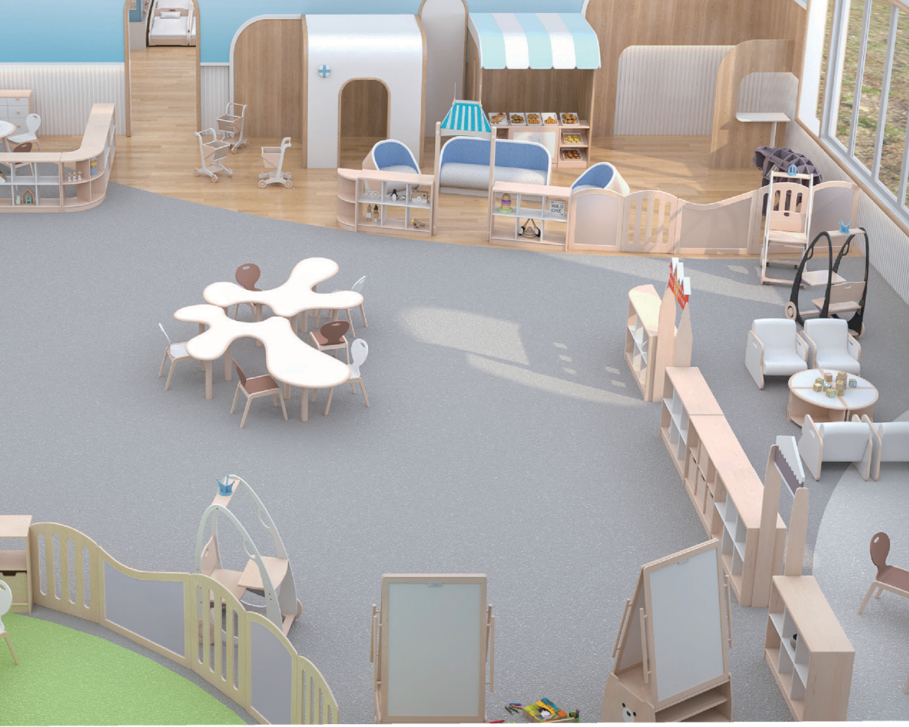 Interior of a children’s playroom with various furniture and play areas, including a round table with chairs, a health clinic area, and a garden section outside the fenced area.