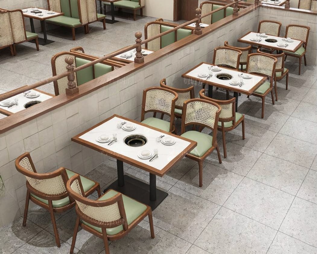 Empty restaurant with tables set for dining, featuring green-cushioned chairs, white tablecloths, and place settings.