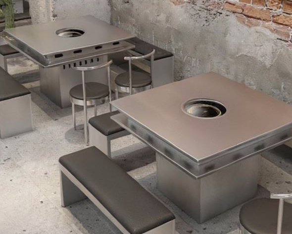 Outdoor restaurant seating with two square tables and various chairs and benches, one table has a central hole for a grill.