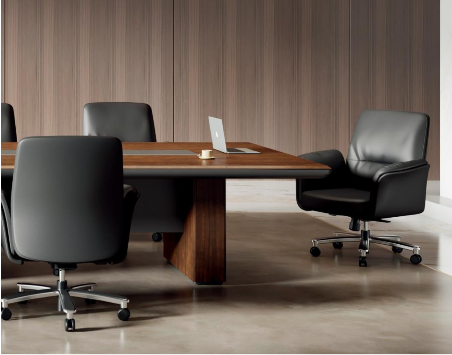 Modern conference room with a wooden table, four black office chairs, a laptop, and a coffee cup.