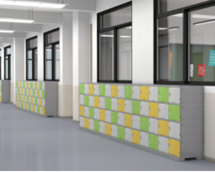 Lockers with green and yellow doors along a school hallway with large windows.
