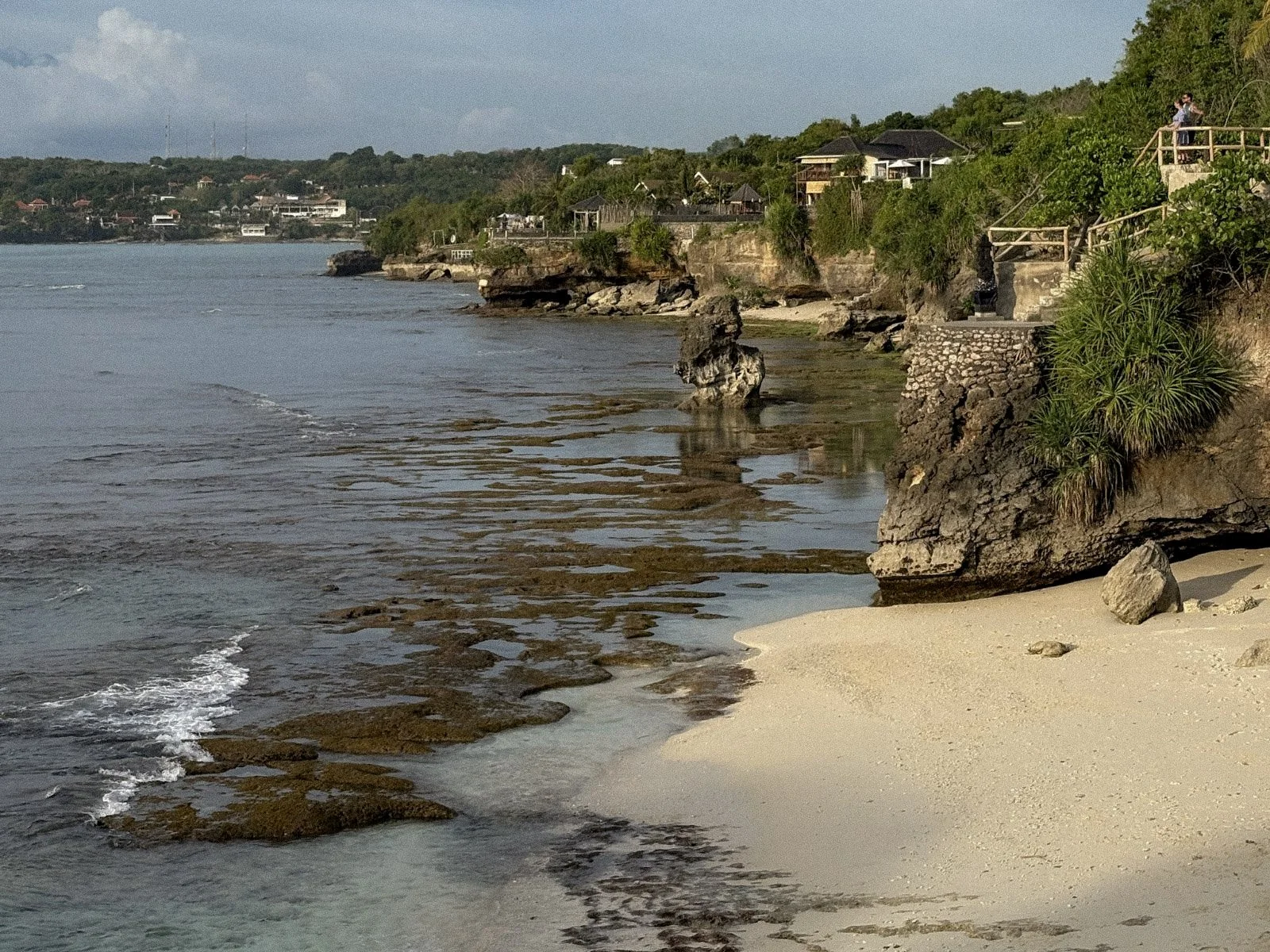Rocky coastline and secret point beach on Nusa Ceningan