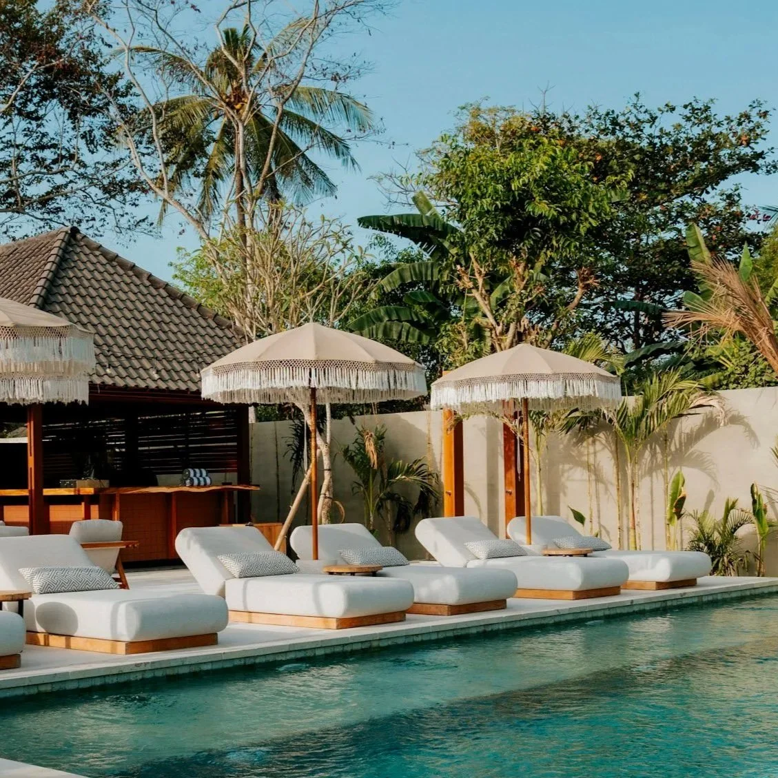 Main pool and poolside loungers at Kalm Lembongan