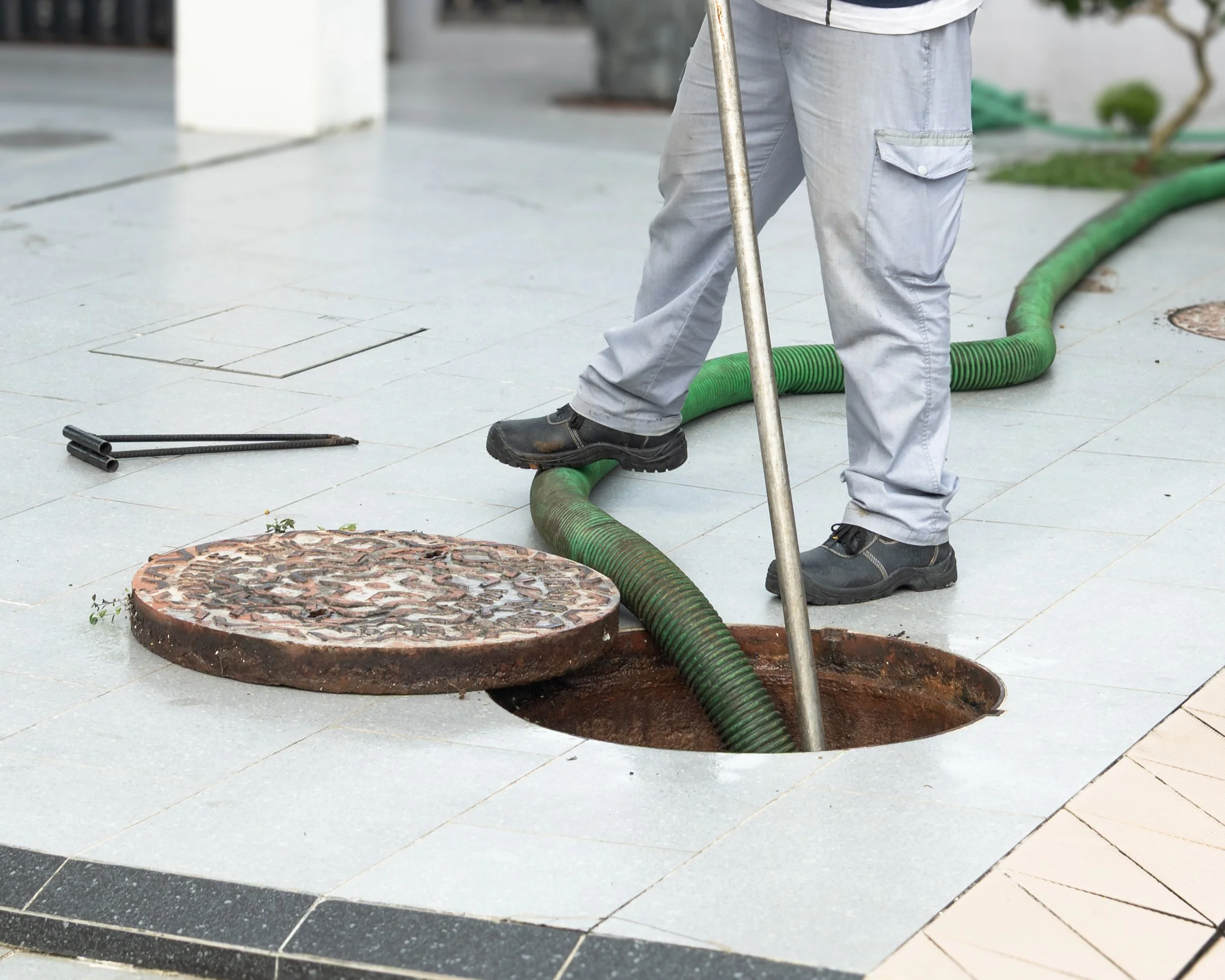 Unblocking and desludging taking place at a residential house in Brunei.
