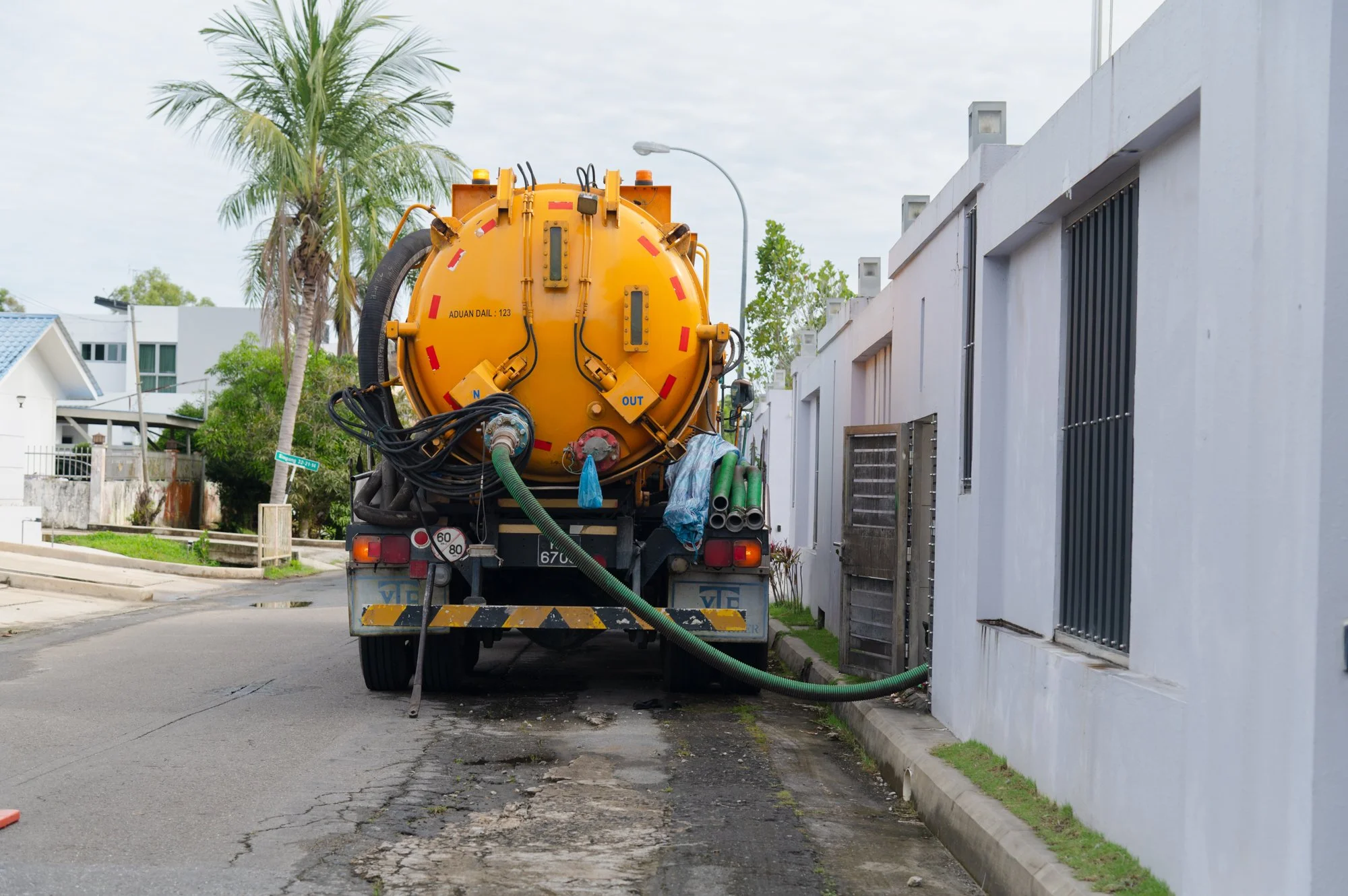 A desludging tanker parked at a residential neighbourhood in Brunei.
