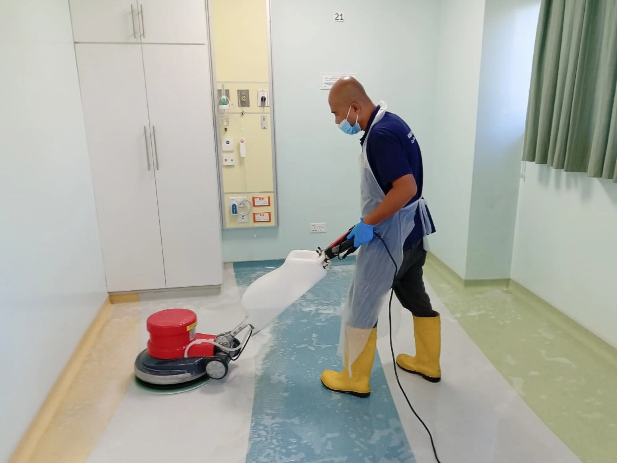 Professional floor scrubbing taking place in a hospital in Brunei.