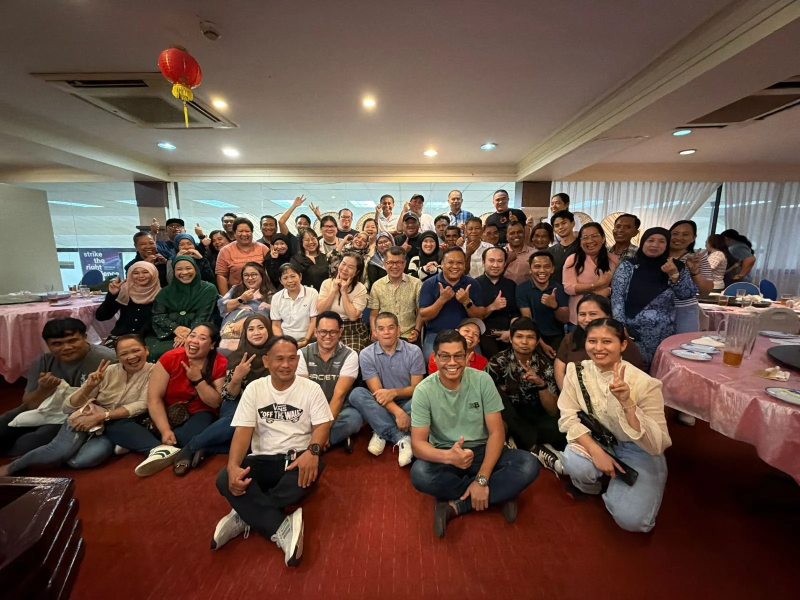 Borneo United team gather for a farewell dinner of their long-time employees in Brunei.
