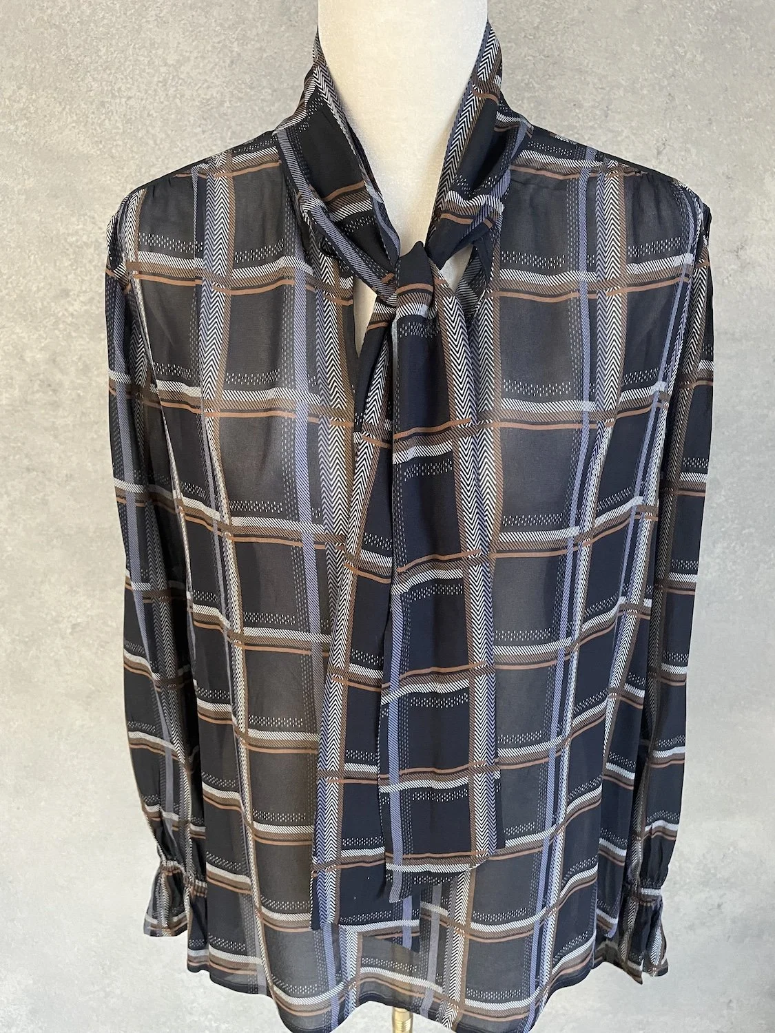 Detailed front view of the Caroline Biss blouse