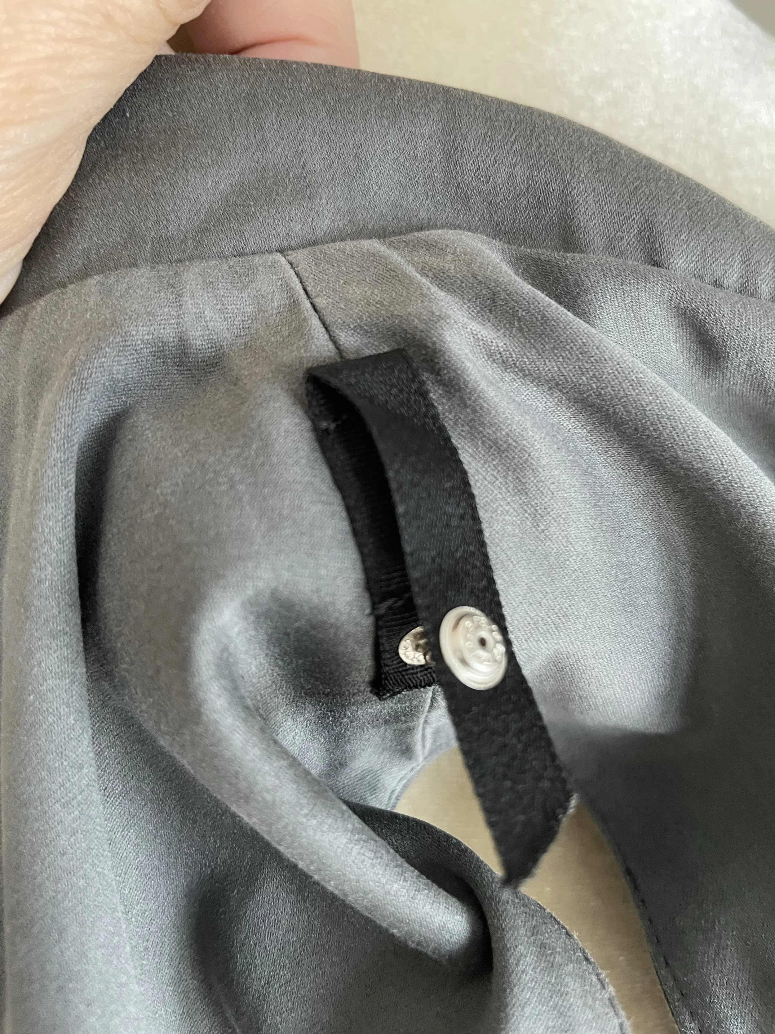 Natan luxury clothing inner garment tag and snap fastener detail