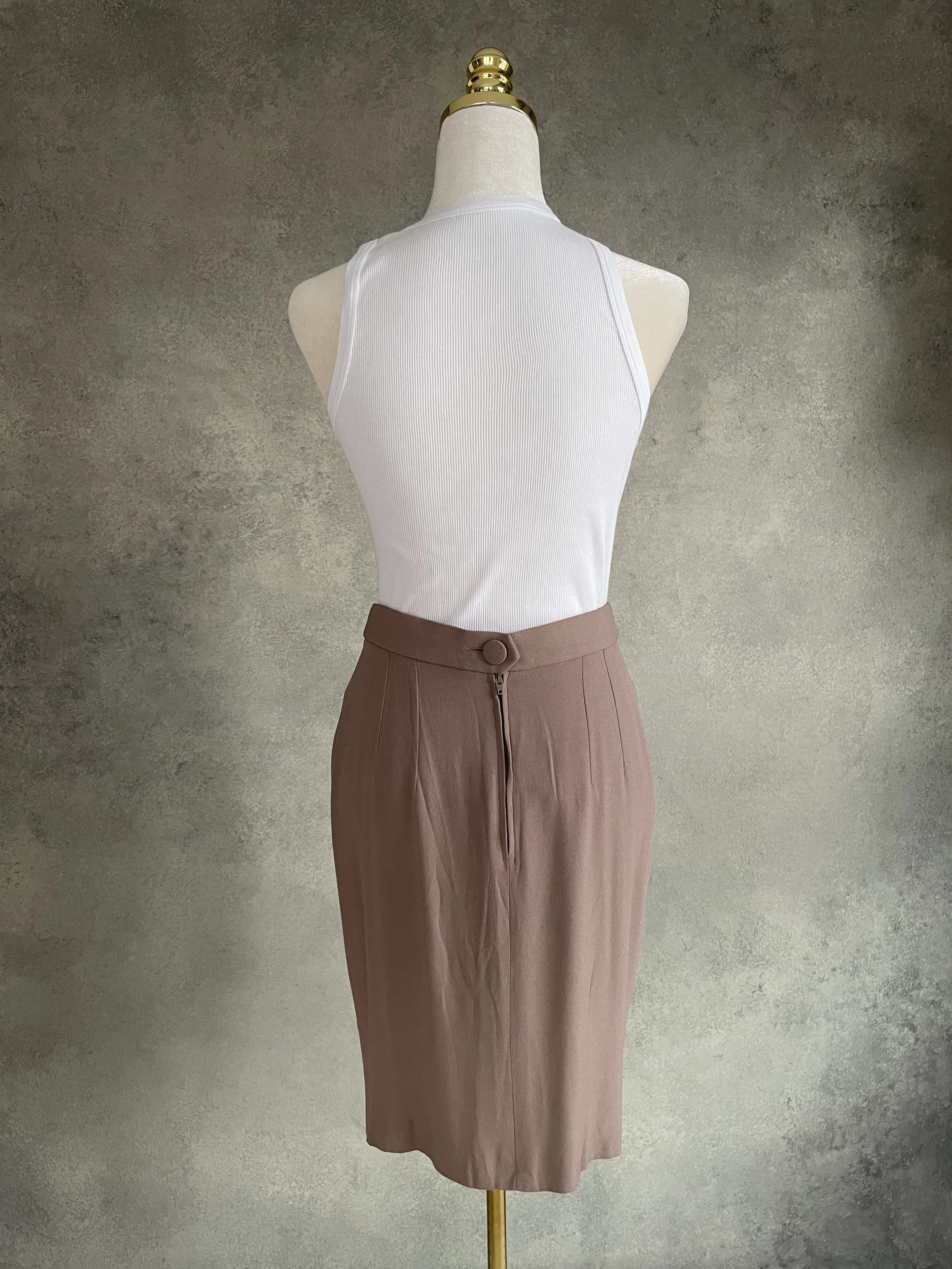 Natan skirt back view, pleated design, beige taupe elegant midi skirt.