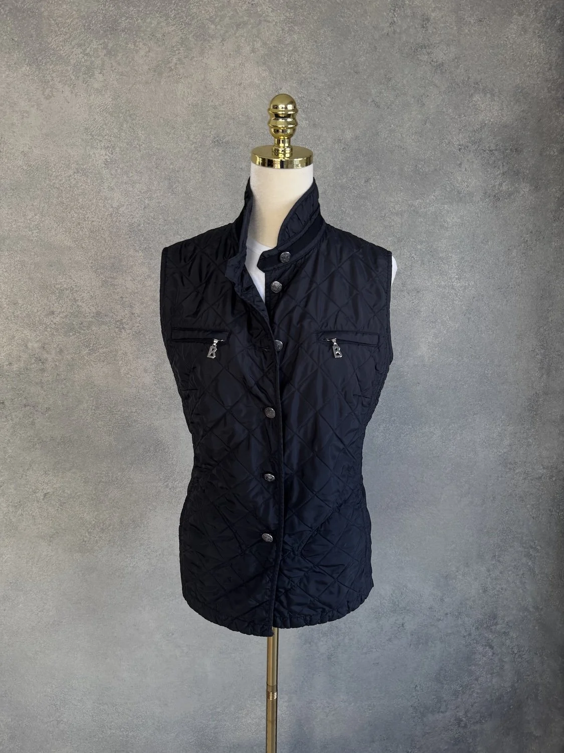Bogner black quilted lightweight vest front view on mannequin