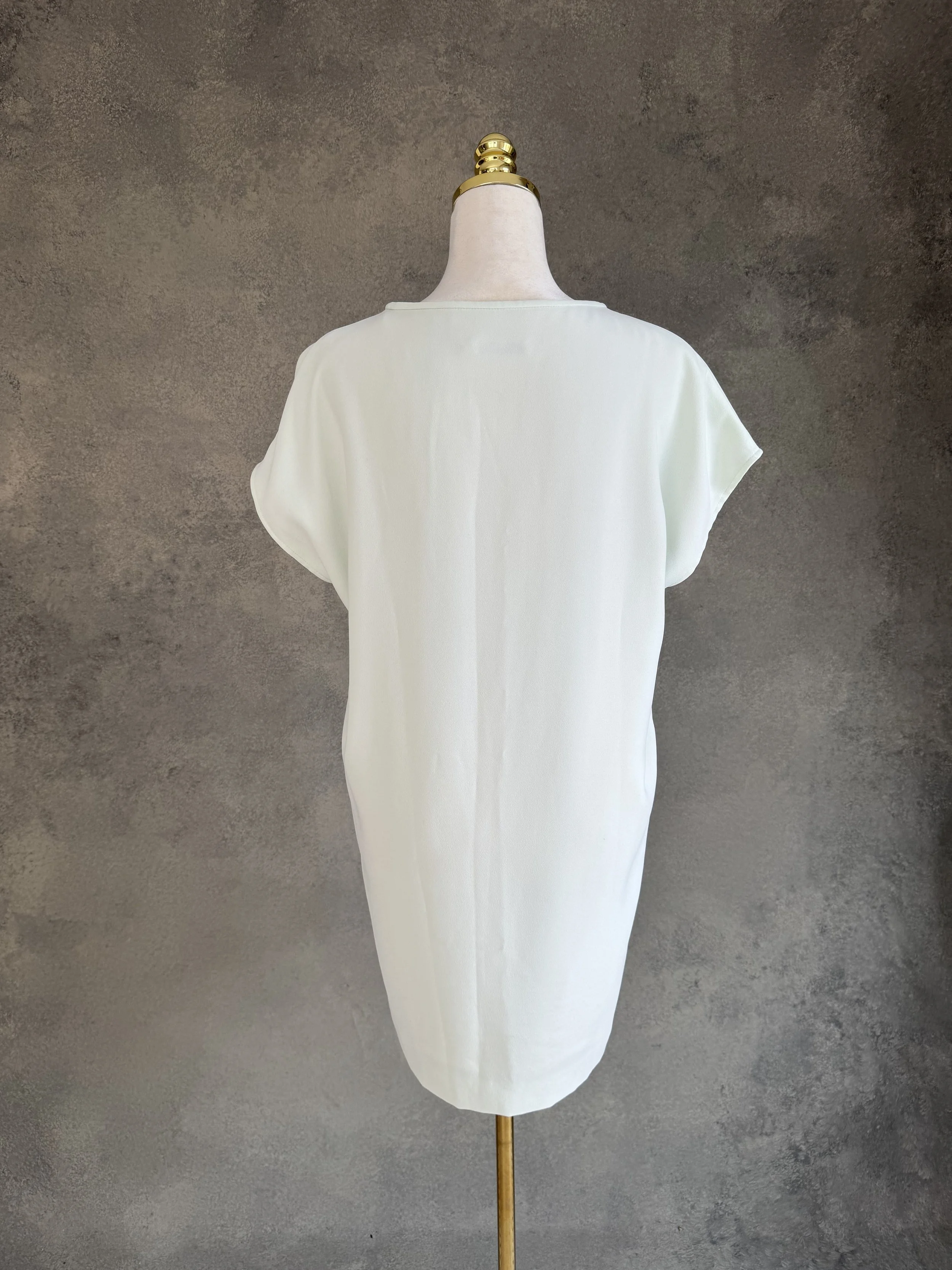 Gigue Kleid Minzgrün, Rückansicht auf der Schneiderpuppe
