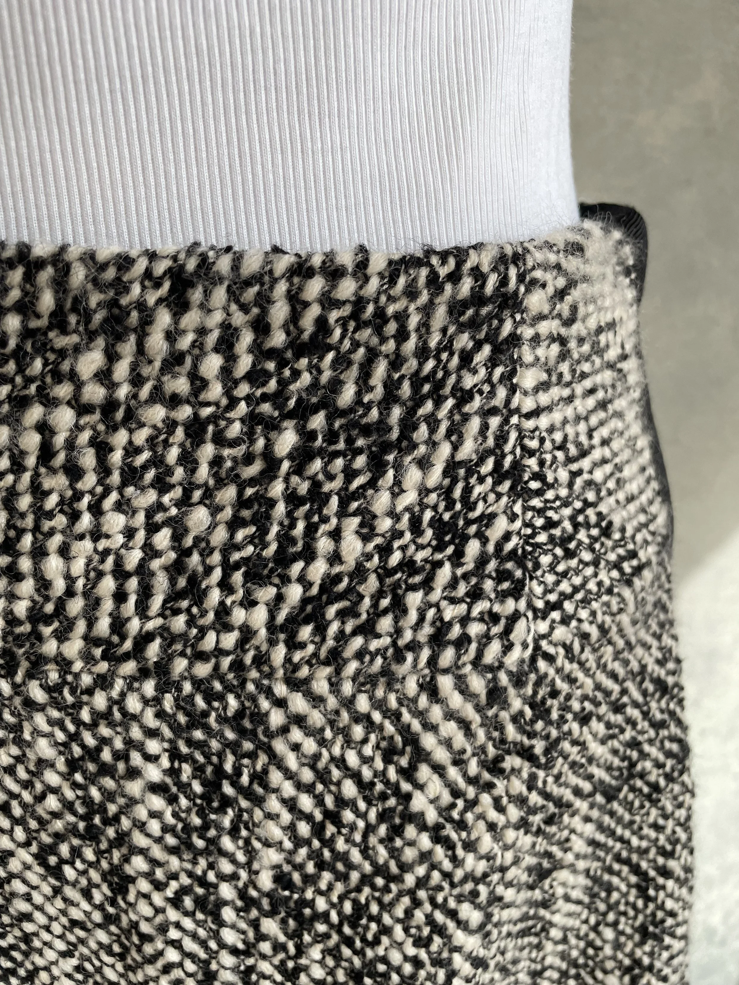 Detailed shot of the wool texture and high-quality craftsmanship.