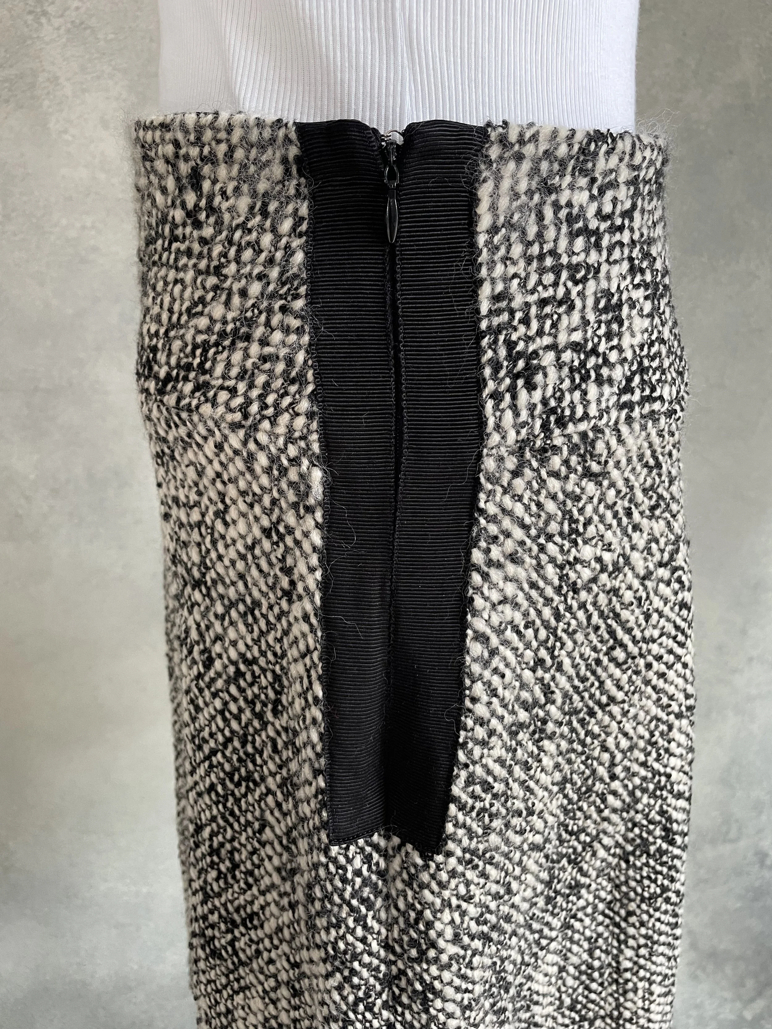 Close-up of the elegant fabric transition between beige and black.
