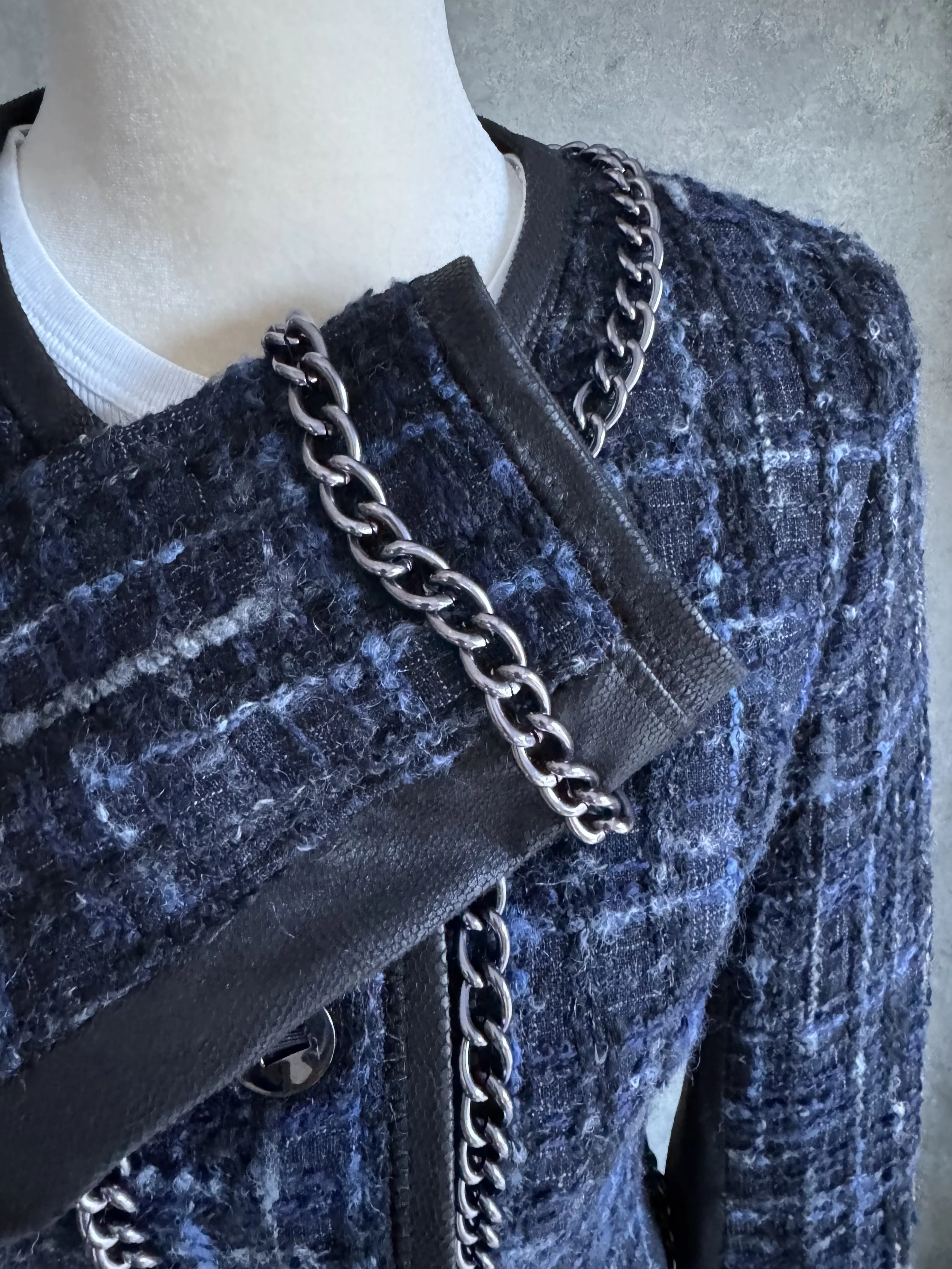 Close-up of the chain-link trim overlay on the blue tweed Riani blazer.