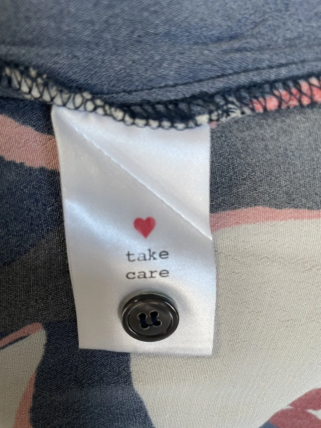 Nathalie Vleeschouwer take care label with spare button attached