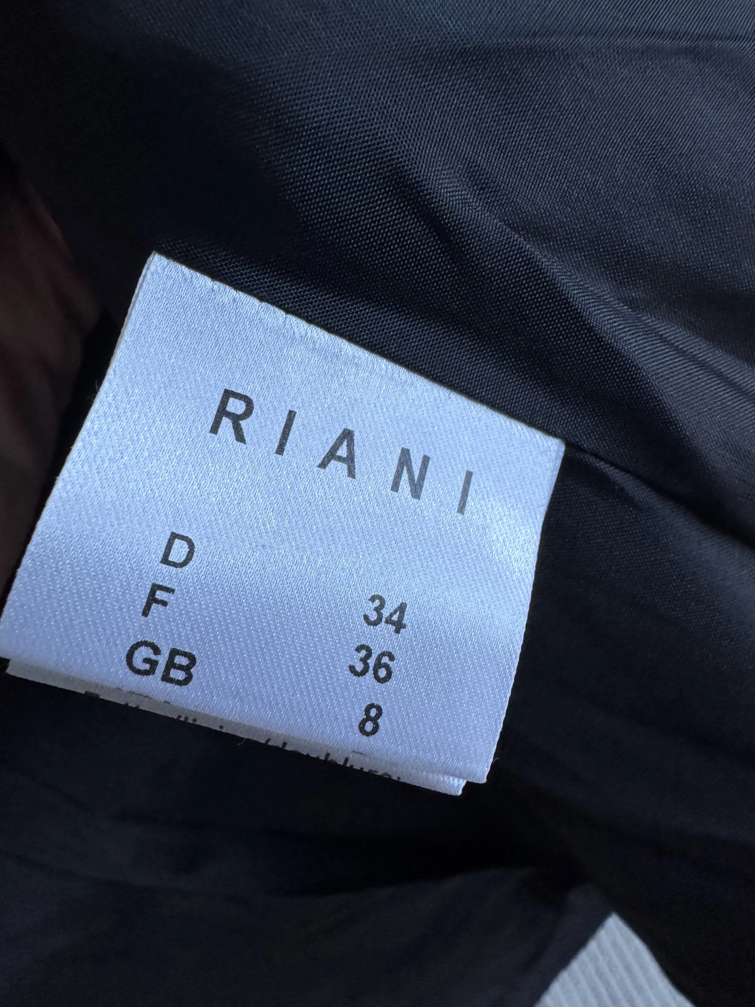Interior brand label for Riani.