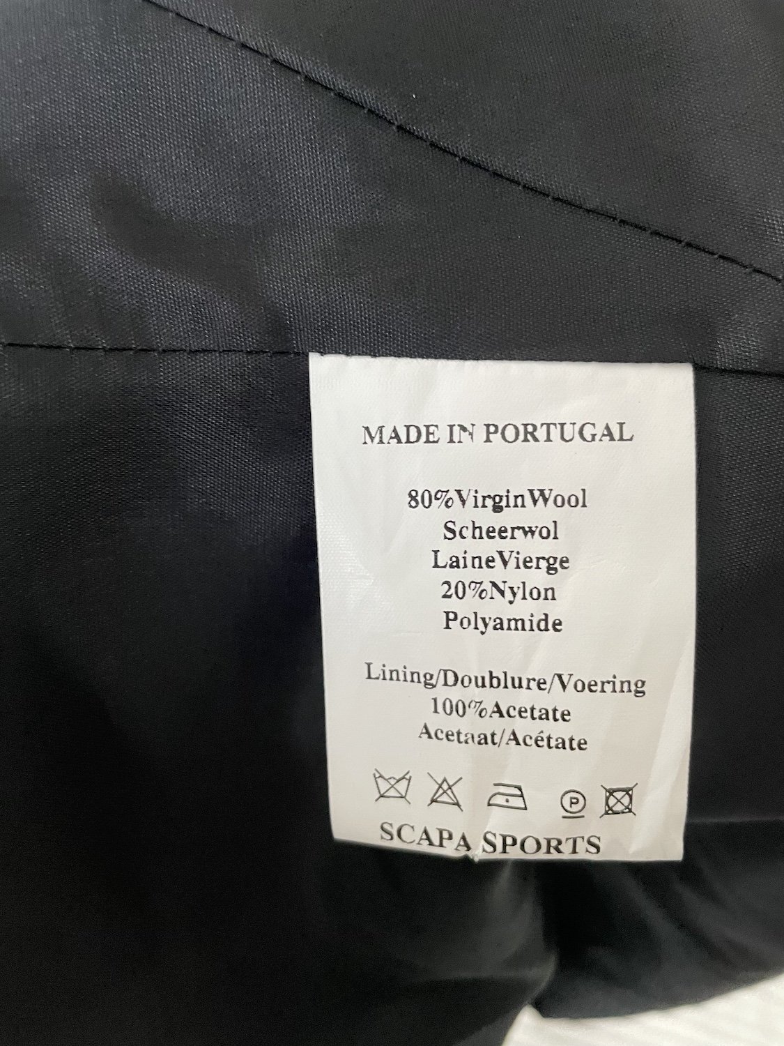 Scapa care and composition label showing 80 virgin wool and 20 nylon