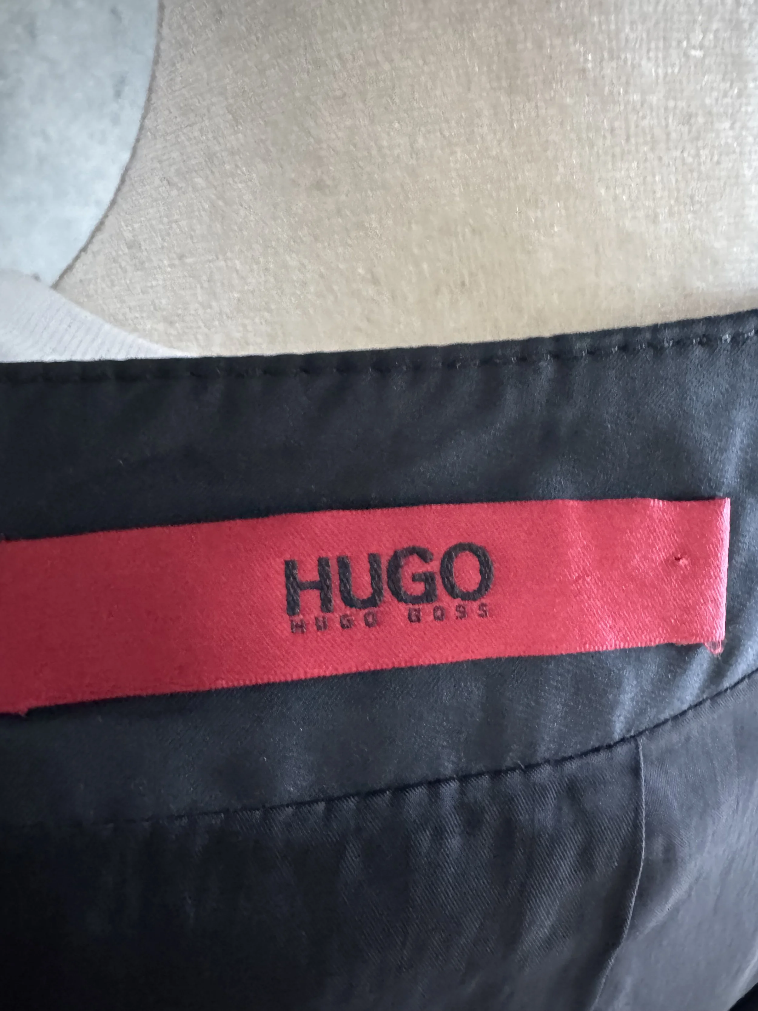 Interior red HUGO brand label on the waistband.