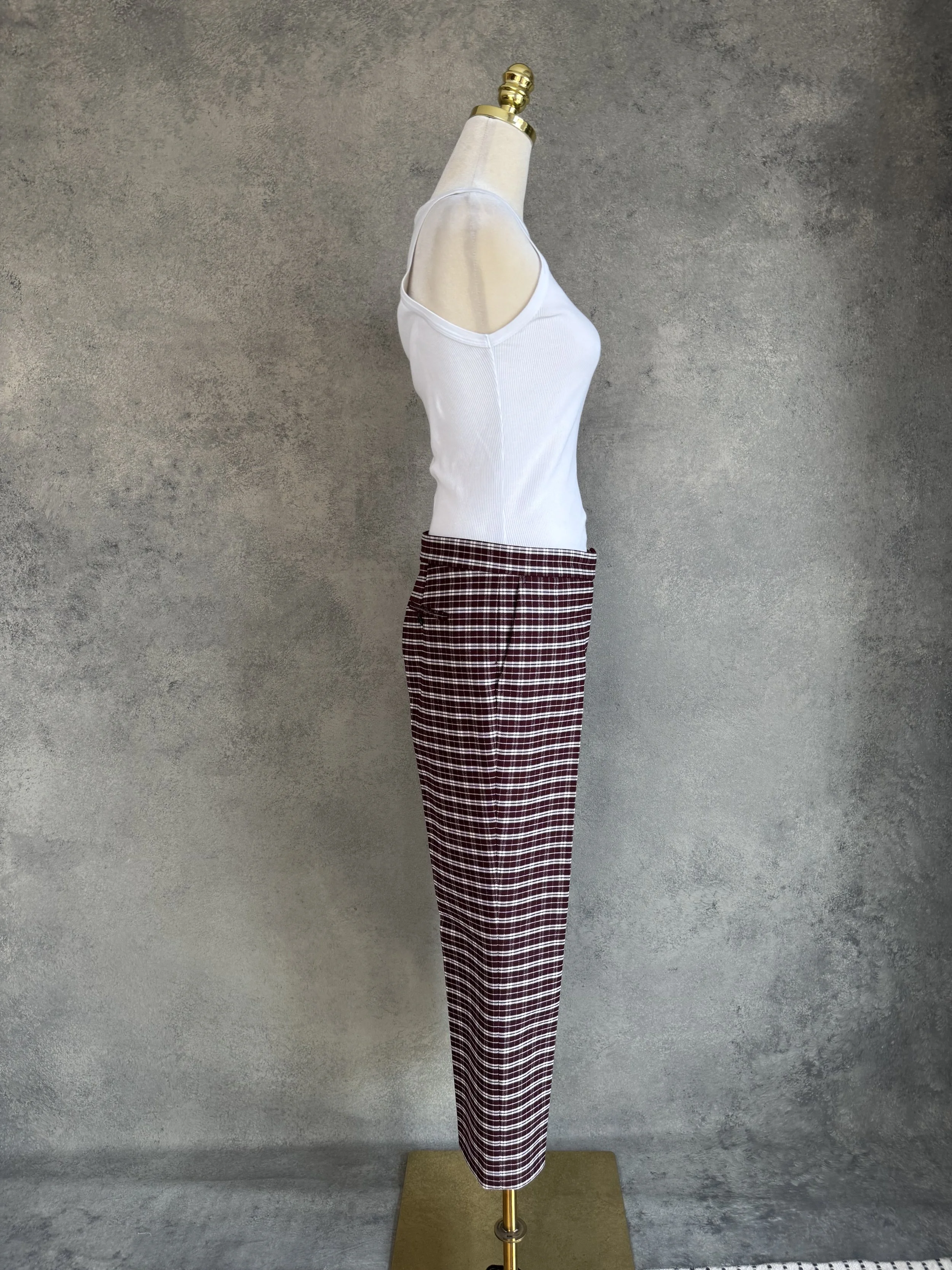 Side profile view of the JOSEPH trousers on a mannequin, highlighting the straight cut and cropped ankle length.