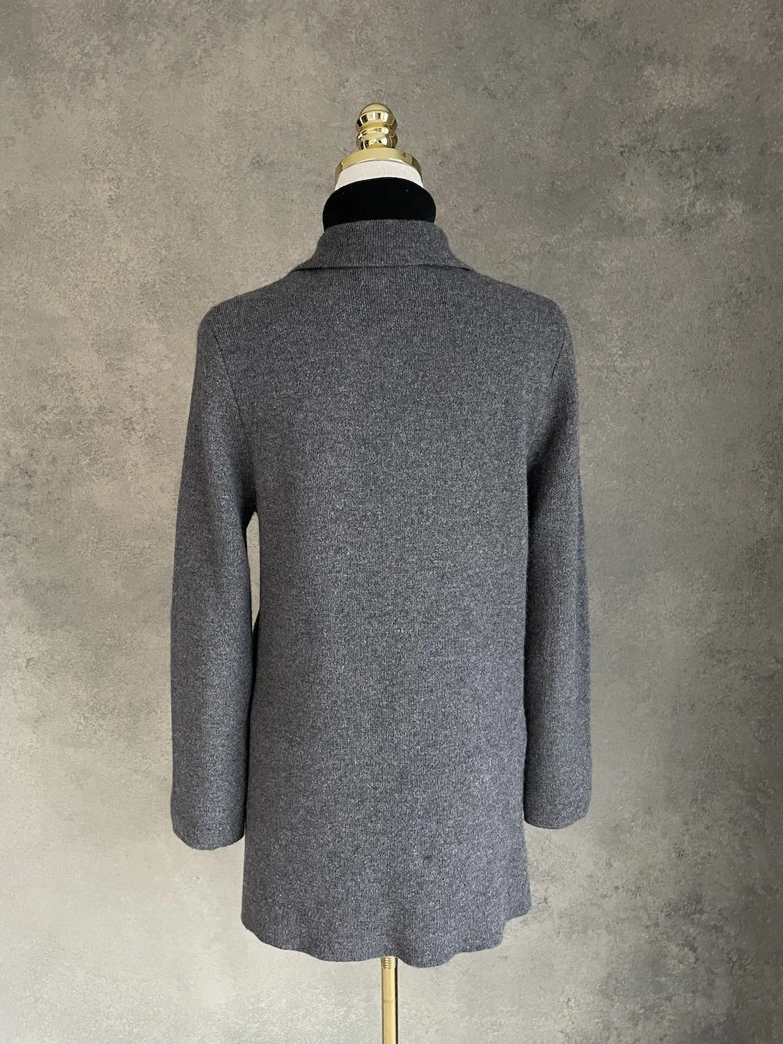 Rear view of the NOTSHY knit coat, showing the clean line and length.