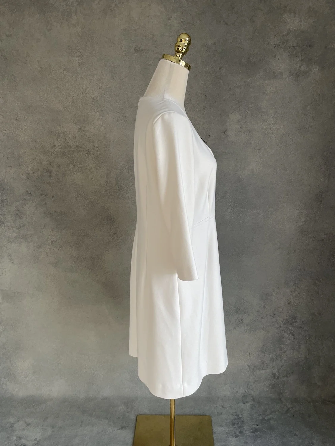 Gigue off-white dress side profile view on mannequin