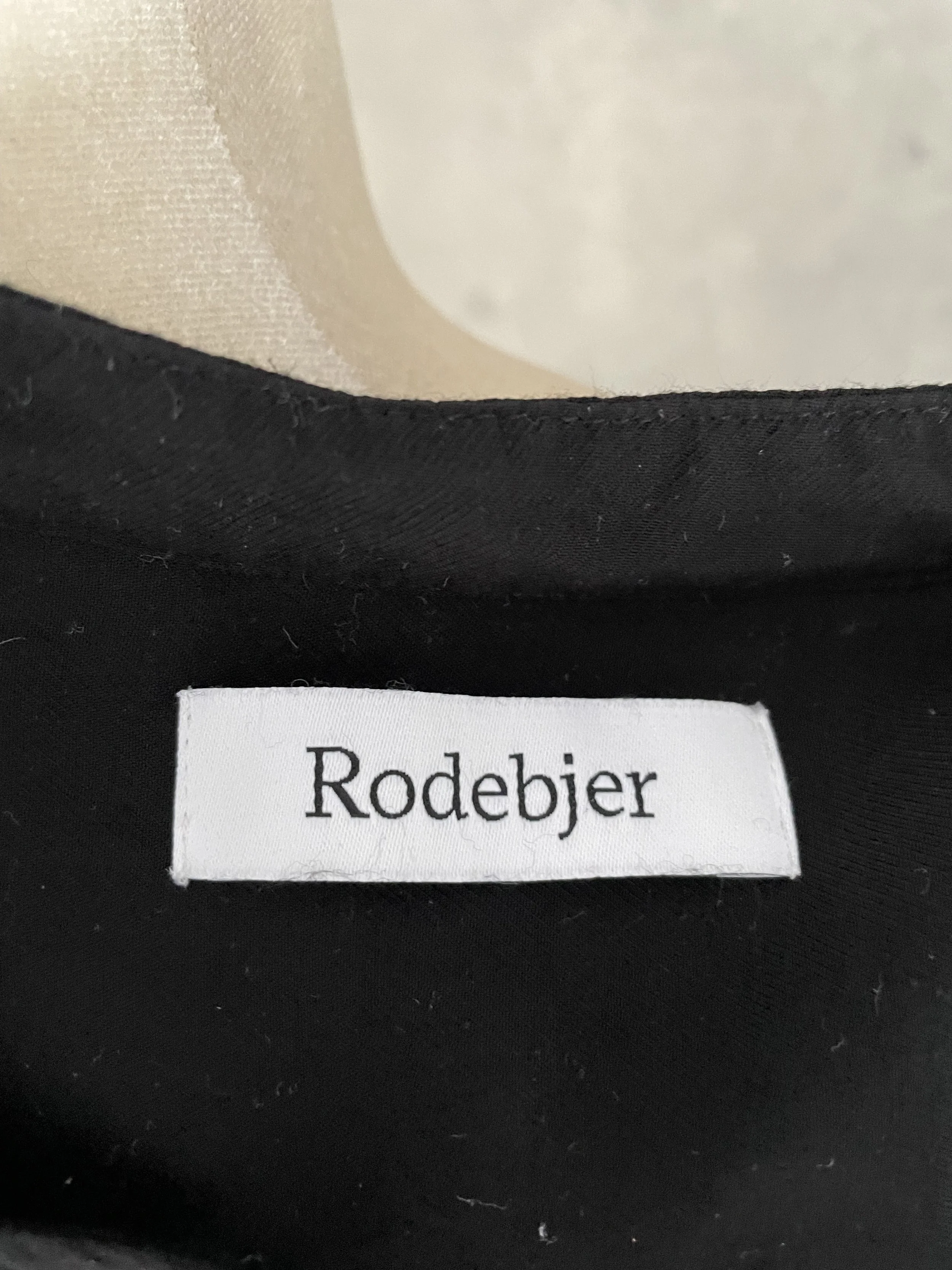 Close-up of the internal Rodebjer brand label.