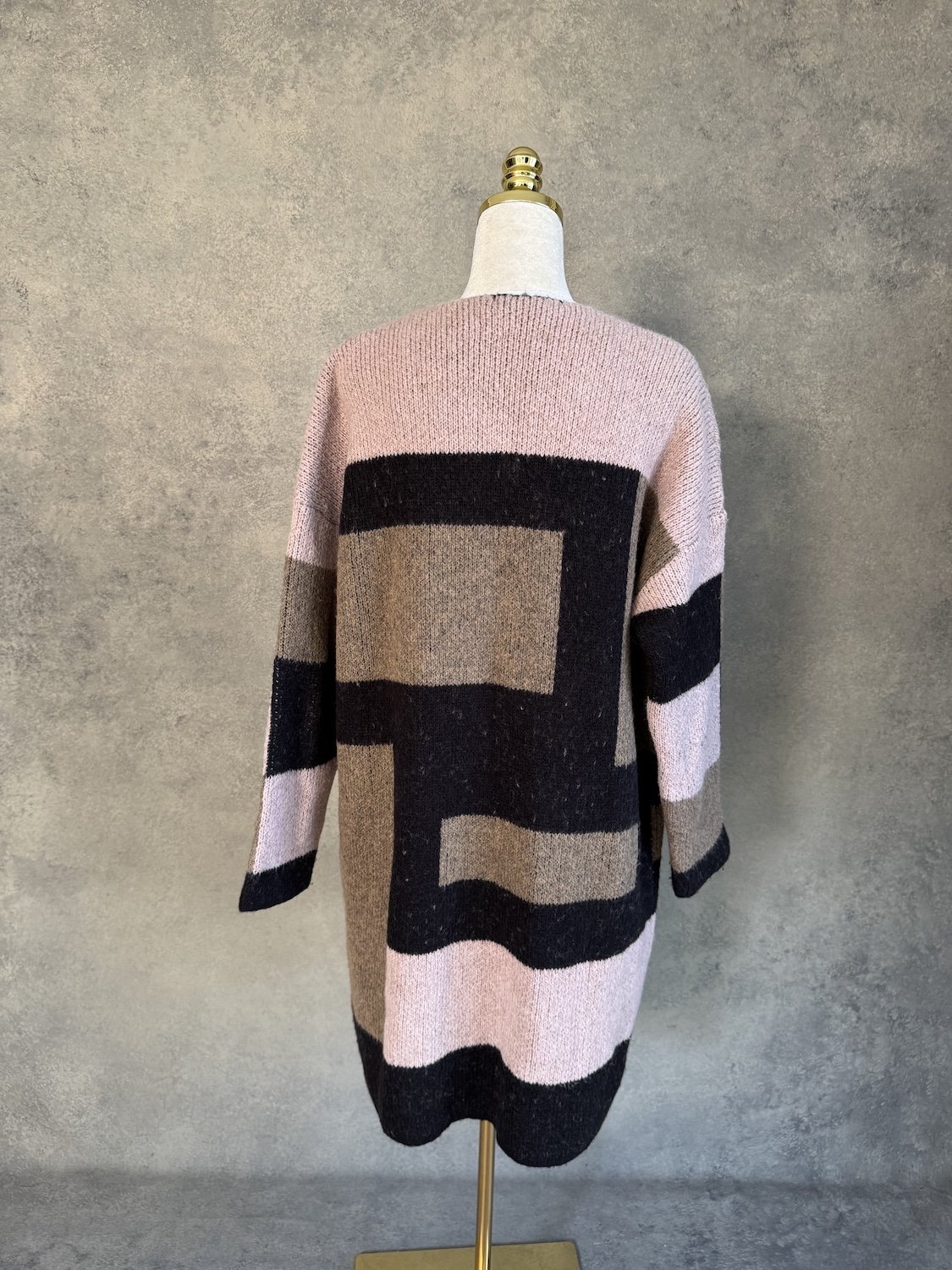 Back view of La Fée Maraboutee oversized color-block knit cardigan