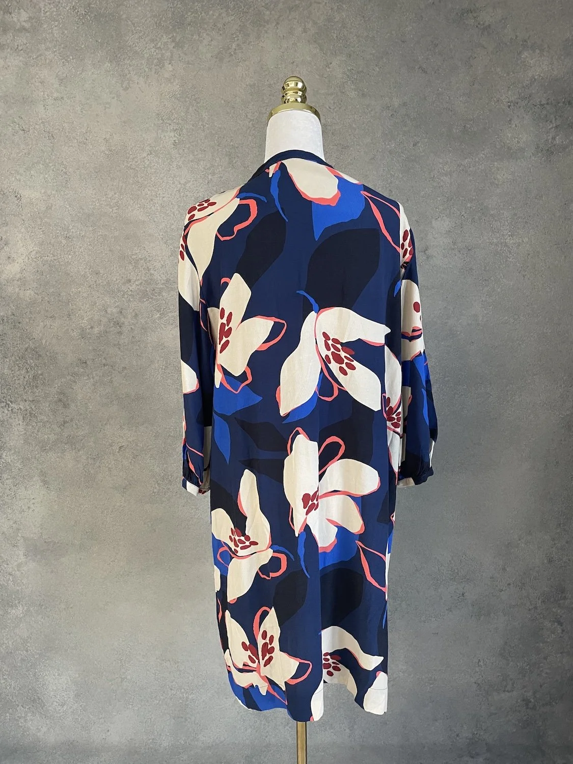 Nathalie Vleeschouwer floral midi dress back view on mannequin