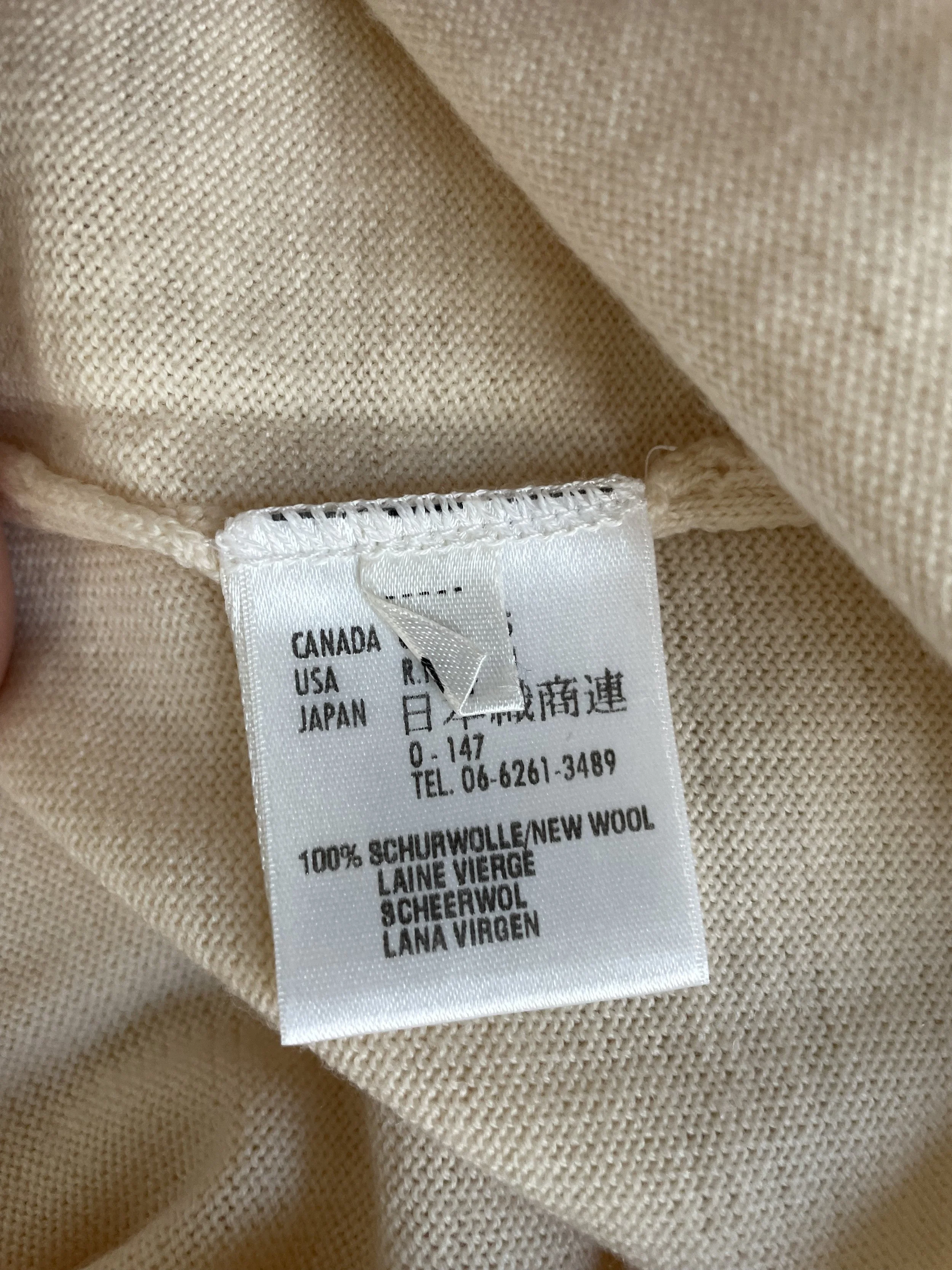 "Interior view of the Escada branding label, confirming authenticity and luxury heritage.