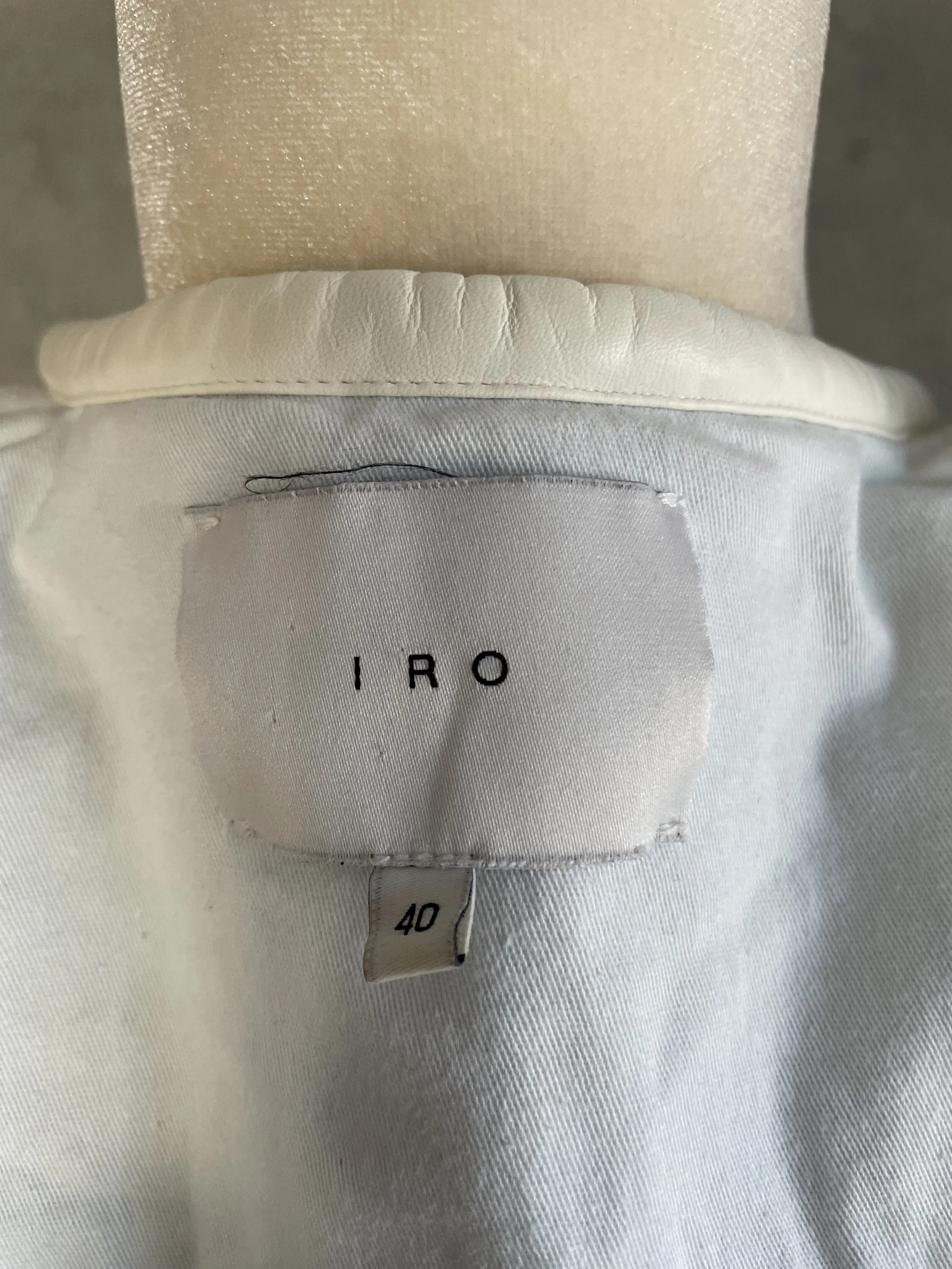 Close-up of the interior collar tag reading 'IRO' with a small '40' size sub-tag below.