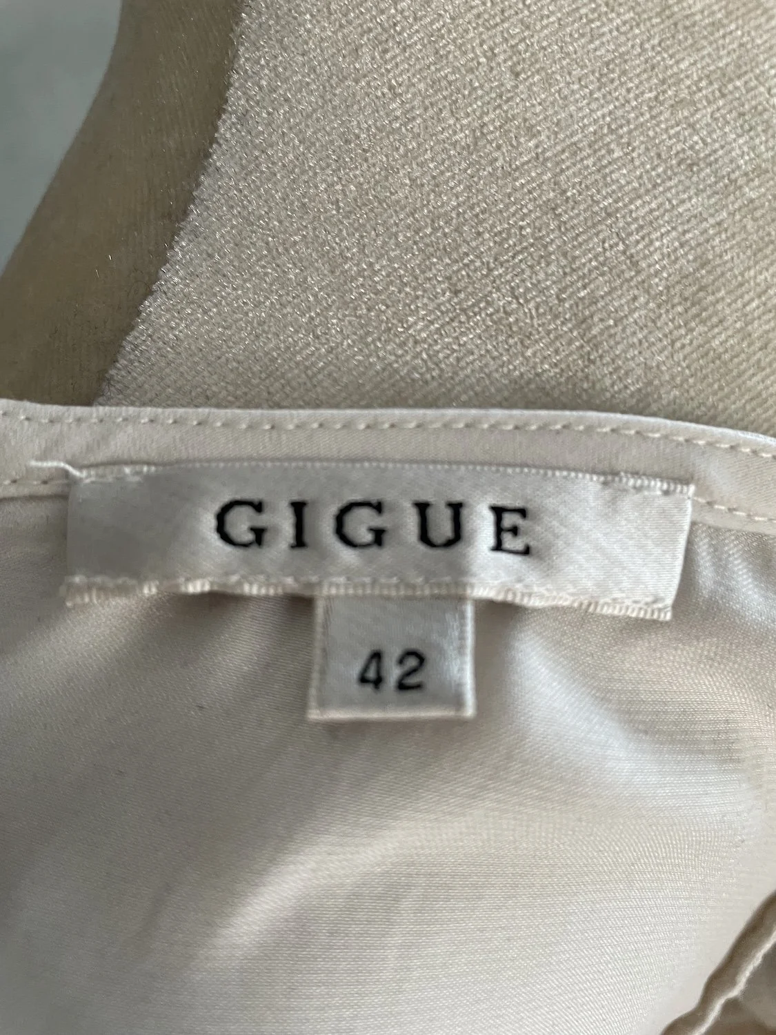 Close-up of the Gigue brand label indicating size 42.