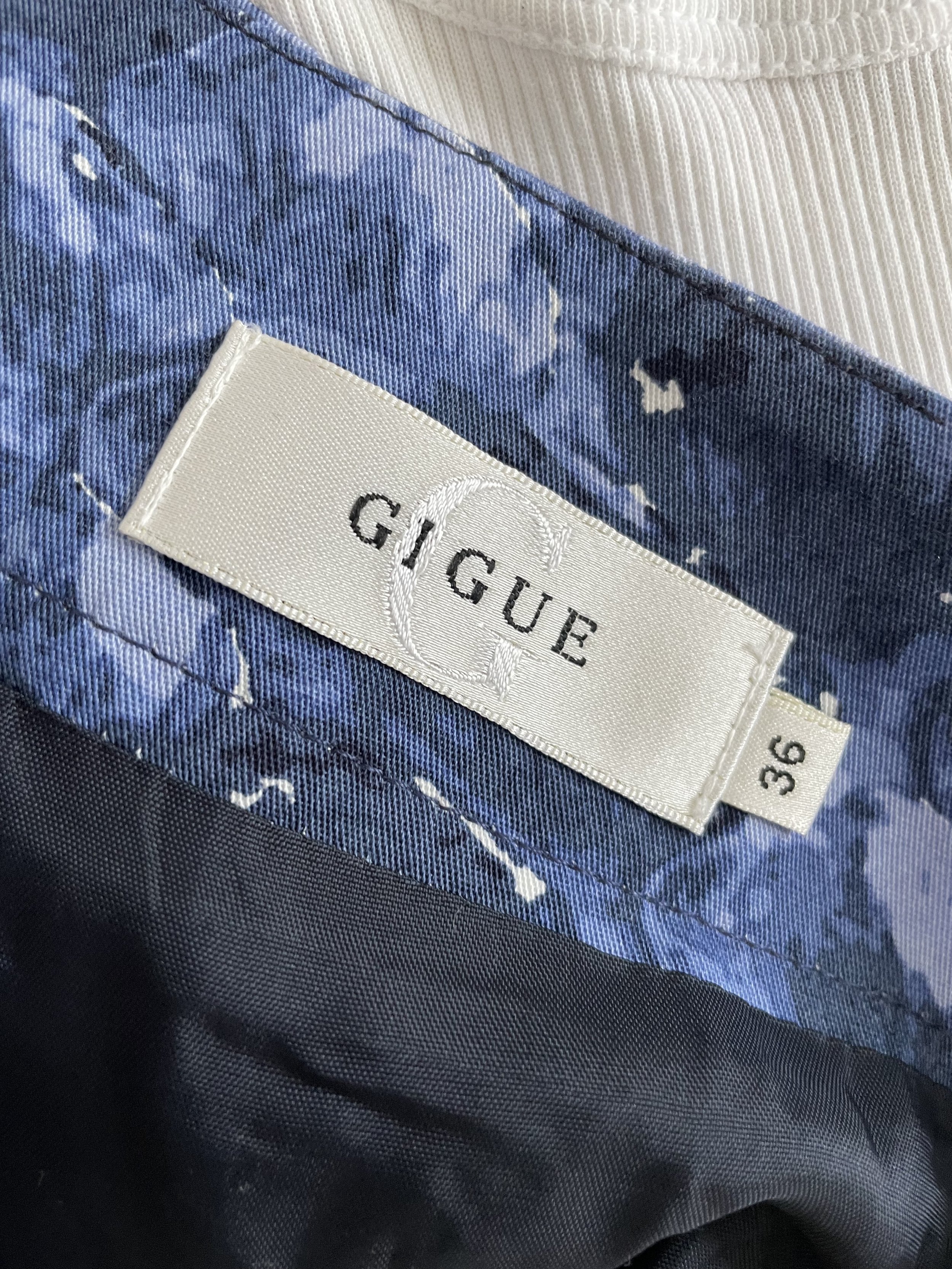 Close-up of Gigue brand label and size tag (36).