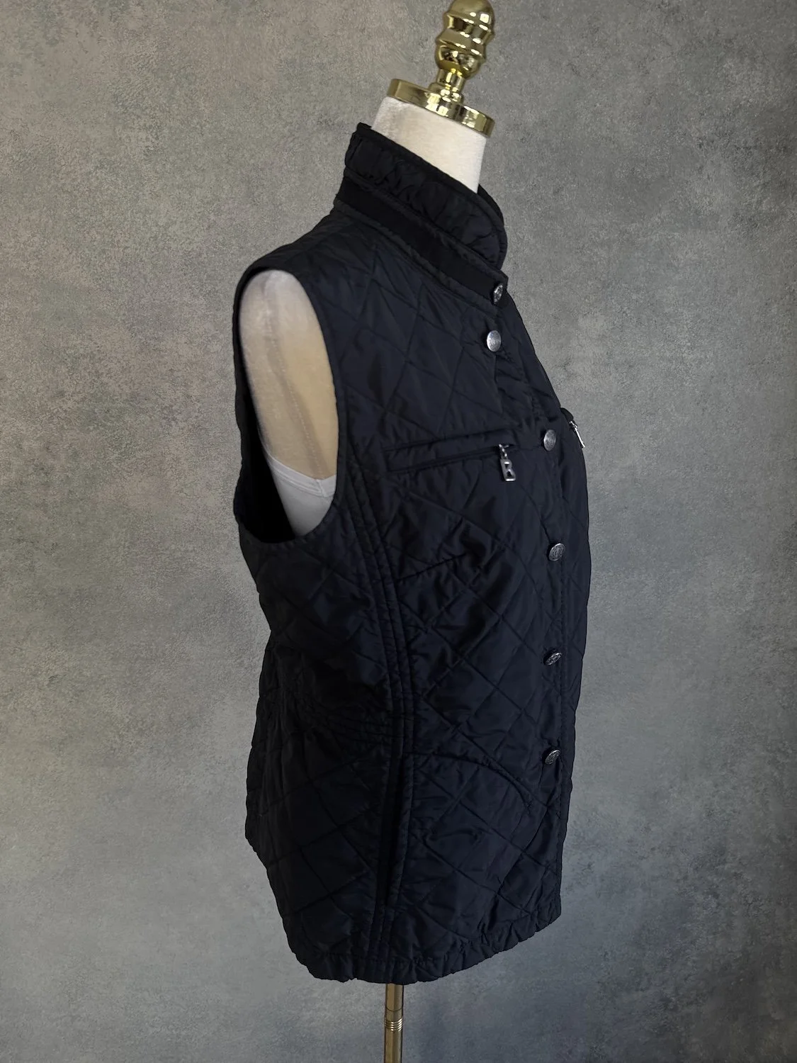 Bogner black quilted vest profile side view on mannequin