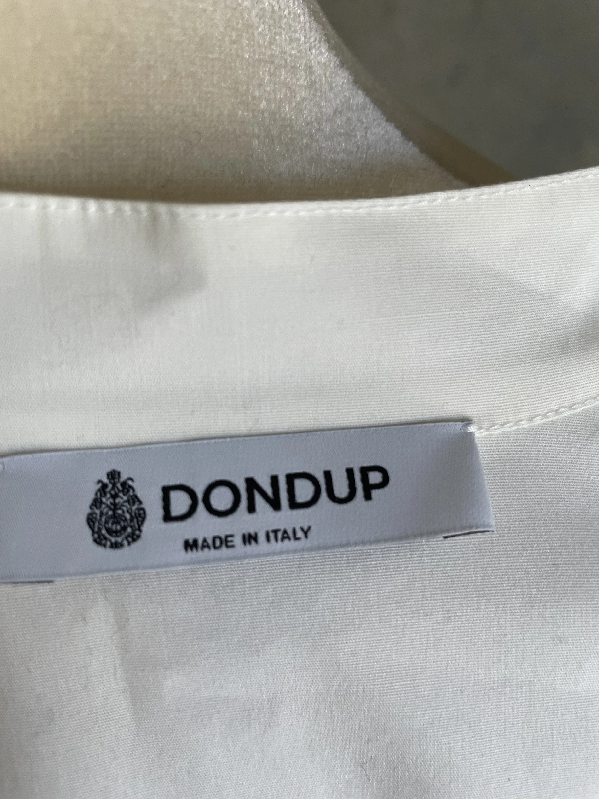Close-up of the interior collar tag reading 'DONDUP MADE IN ITALY'.